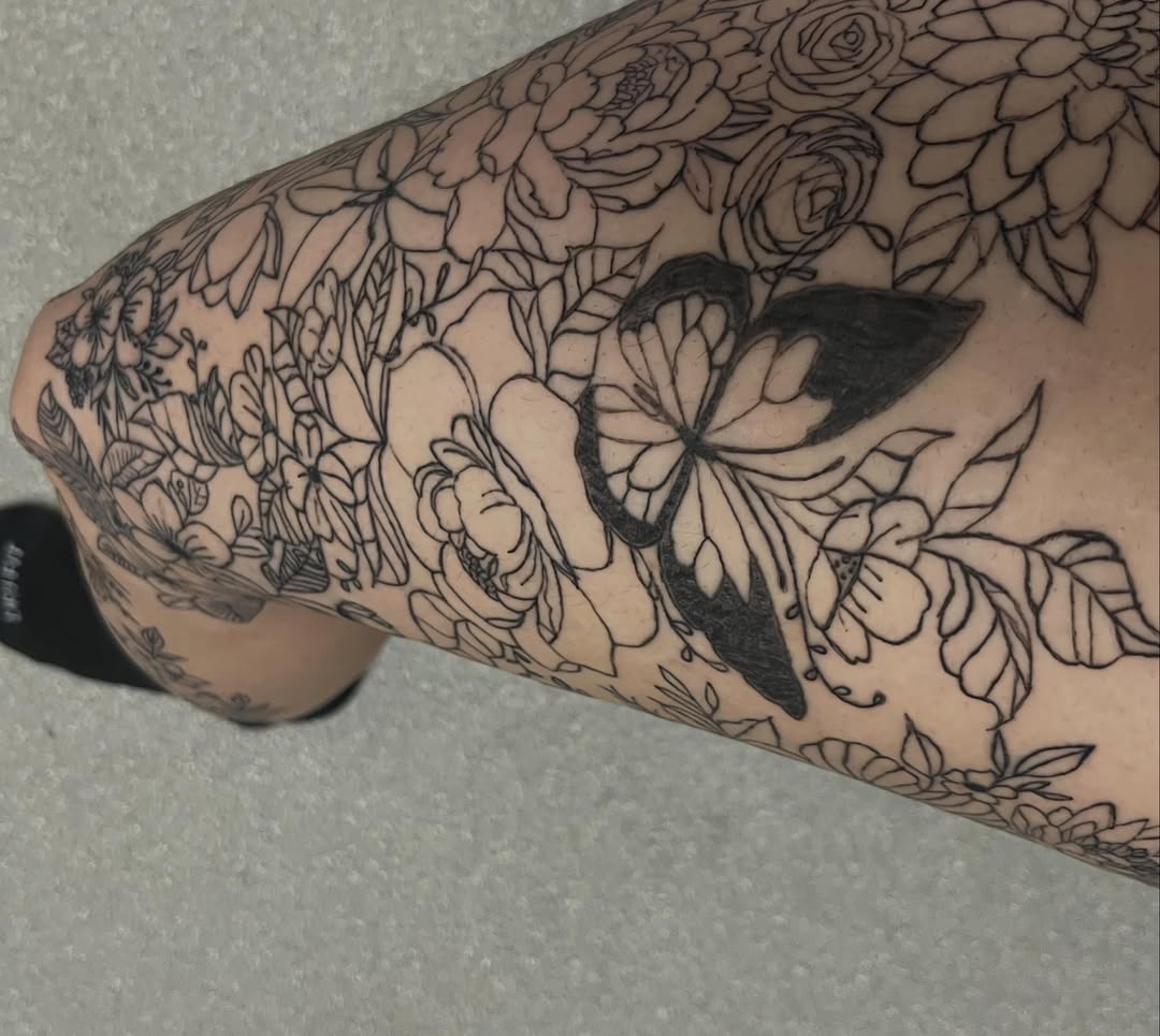 Butterfly and flowers sketch tattoo on the forearm by The feminine ink