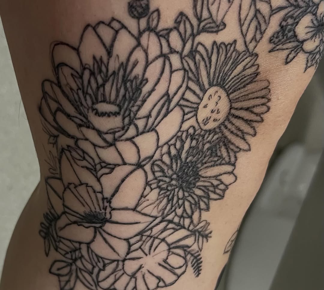 Floral arrangement dotwork tattoo on the forearm by The feminine ink