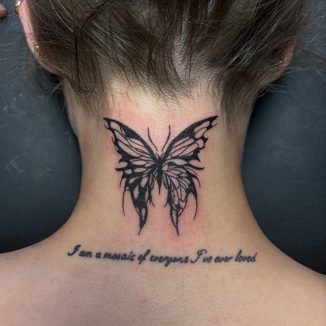 Shattered butterfly fine line tattoo on the neck by Michelle