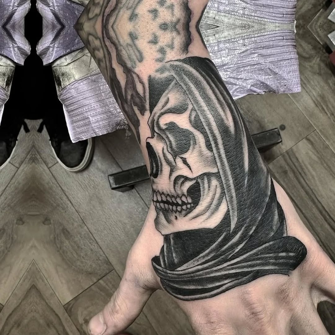 Grim reaper skull realism tattoo on the forearm by Murl Dietrich