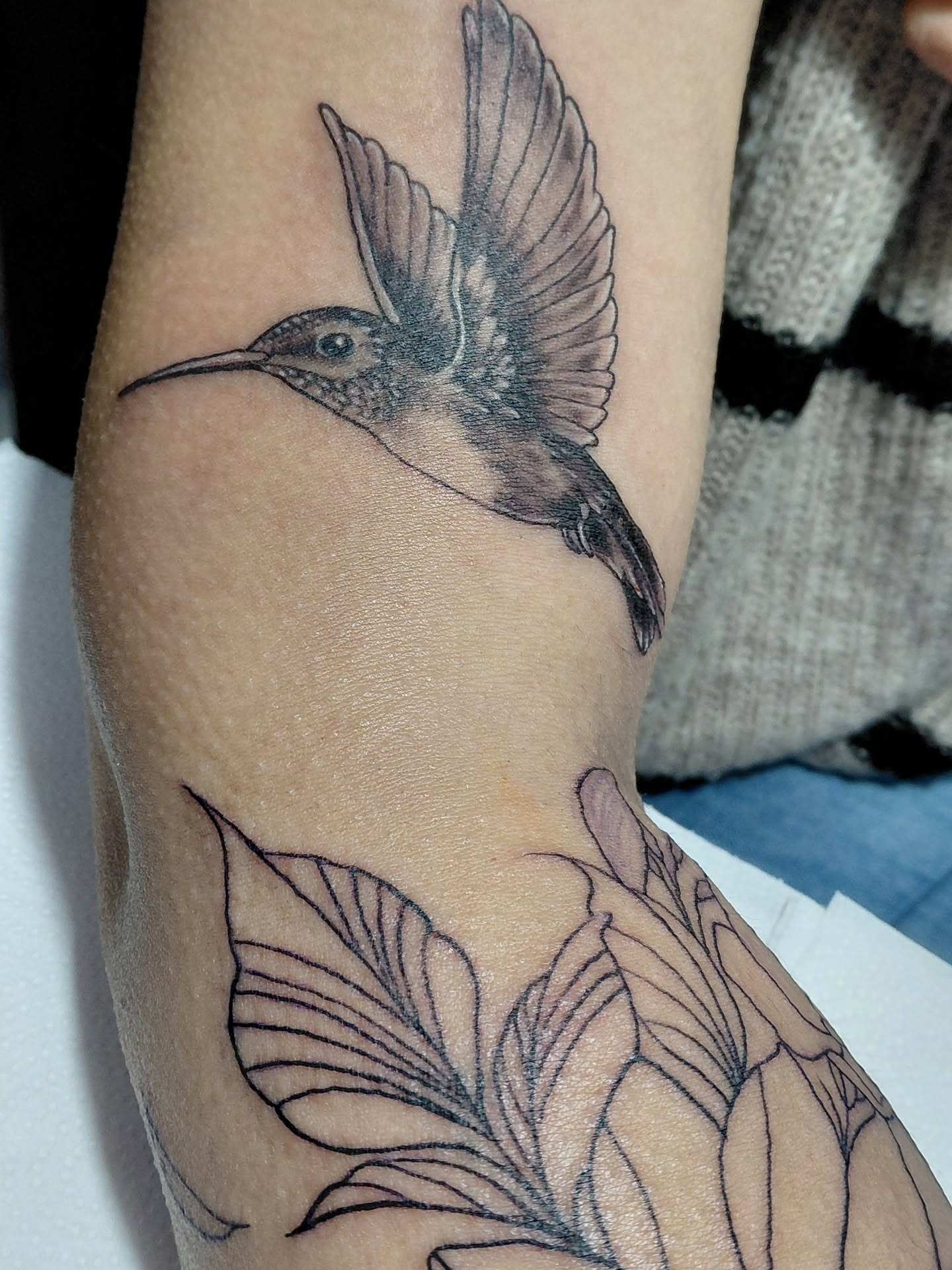 Hummingbird realism tattoo on the forearm by Jose Rodriguez