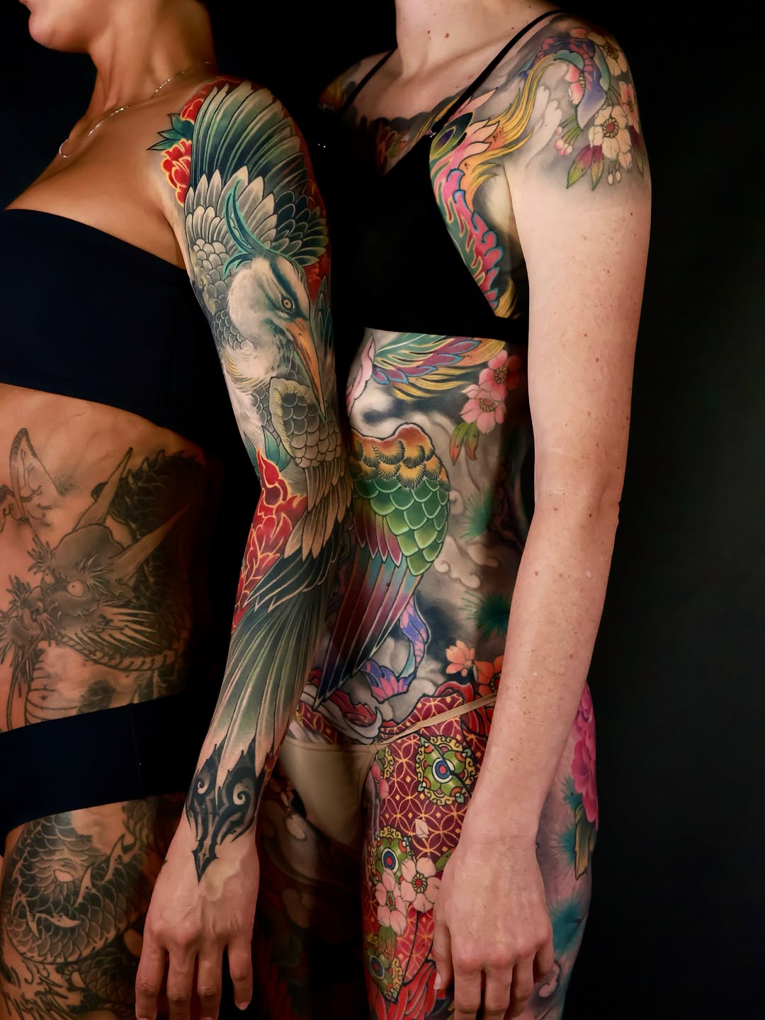 Crane and phoenix with floral elements Japanese tattoo on the upper arm by Hocheon