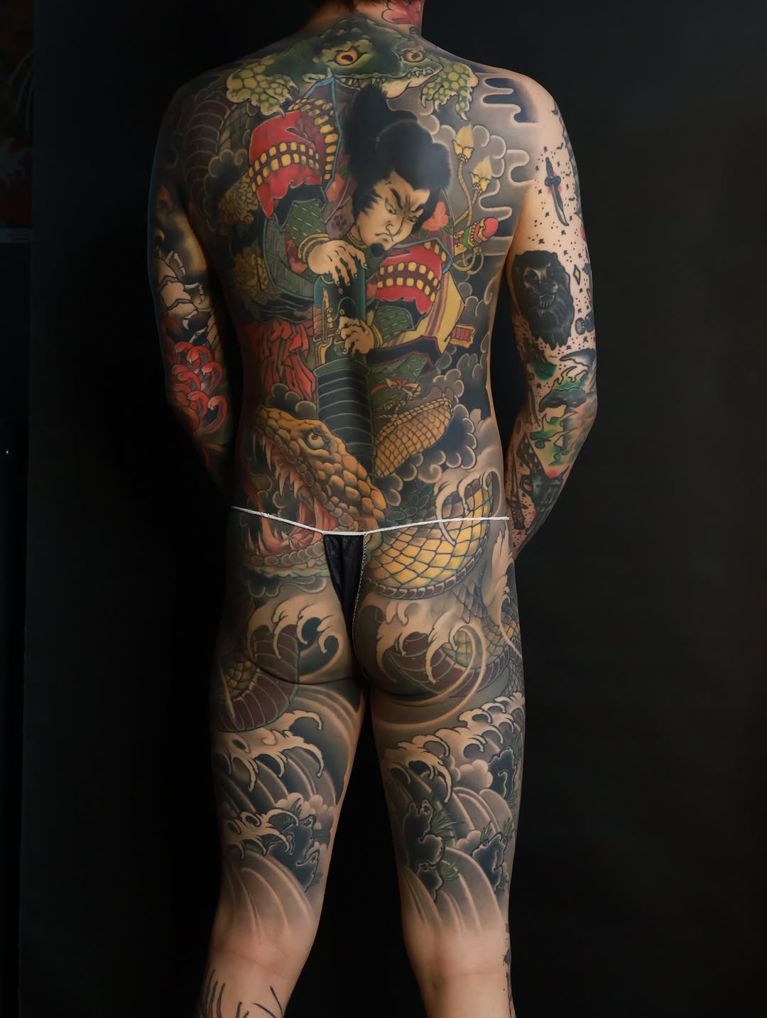 Samurai and dragon with waves Japanese tattoo on the back by Hocheon