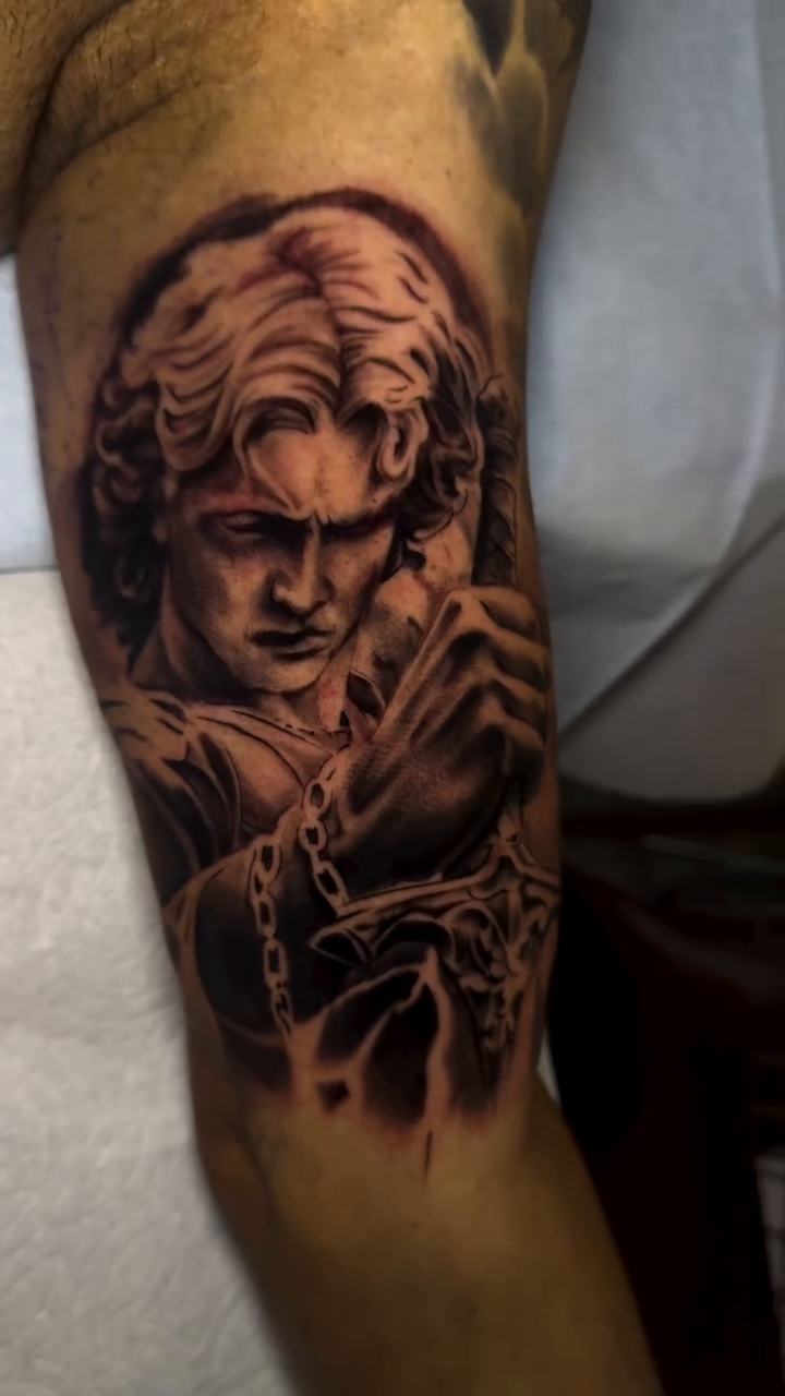Tattoo by @dannysan14 — realism, black_and_grey