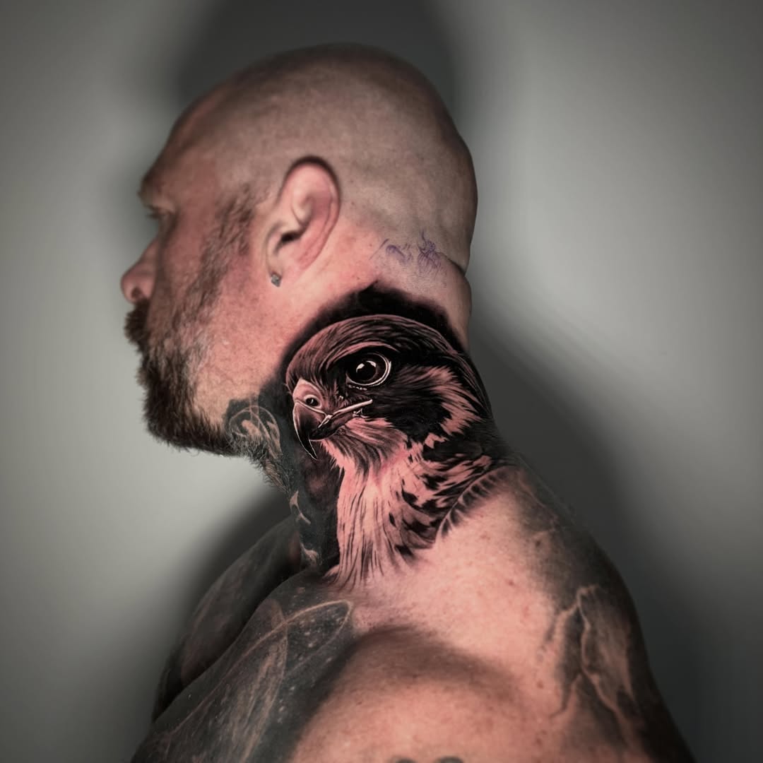 Hawk realism tattoo on the shoulder by TJ Schunemann