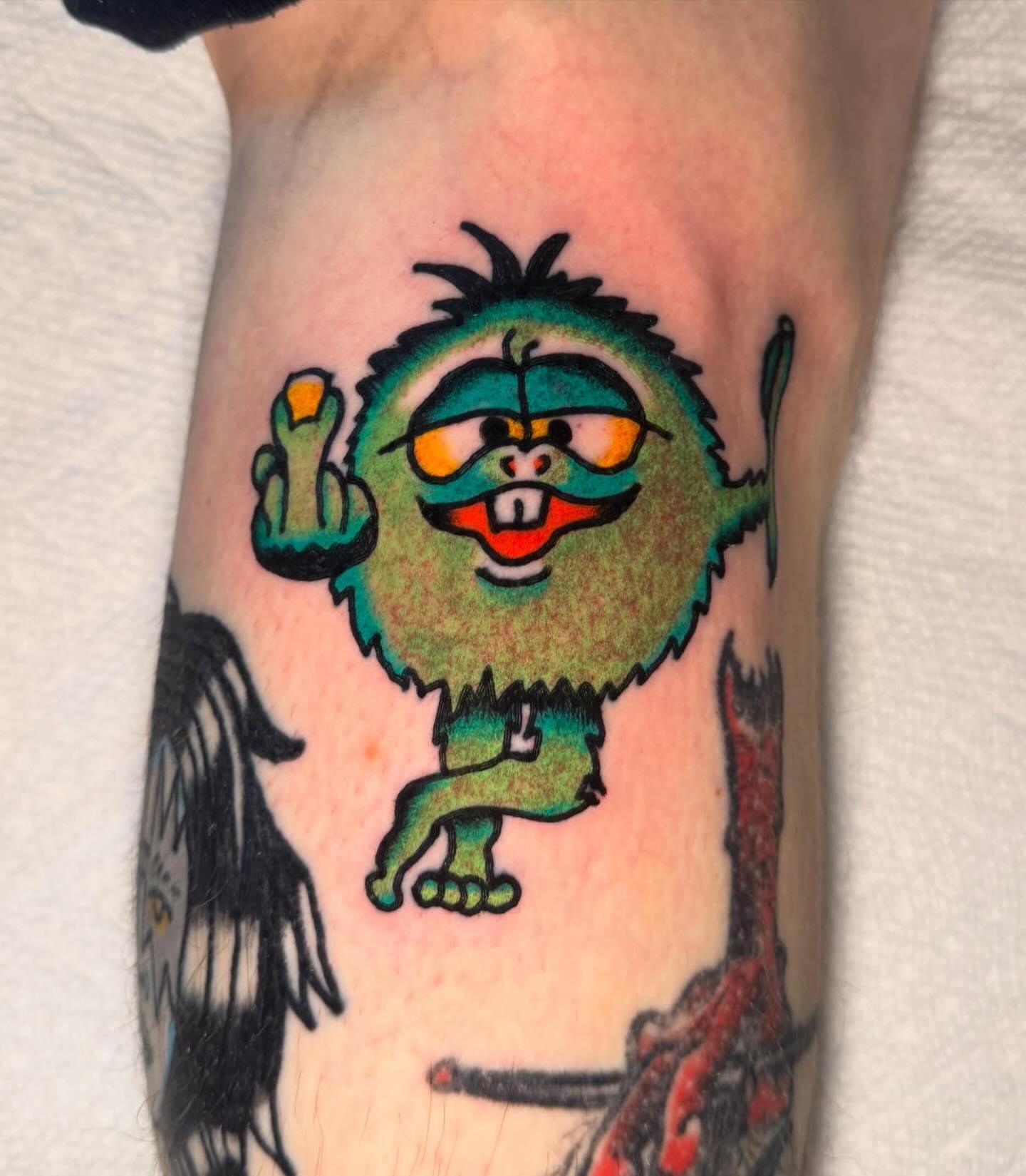 Monster new school tattoo on the forearm by Harrison ♠️