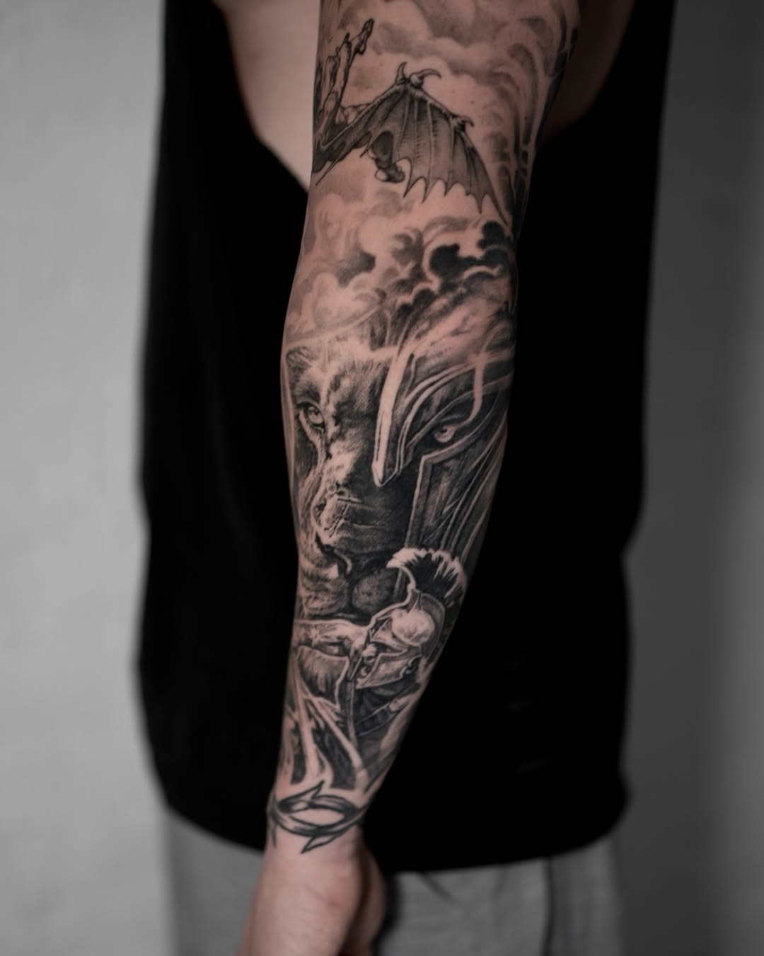 Lion, spartan helmet, dragon Japanese tattoo on the forearm by Mark Vata