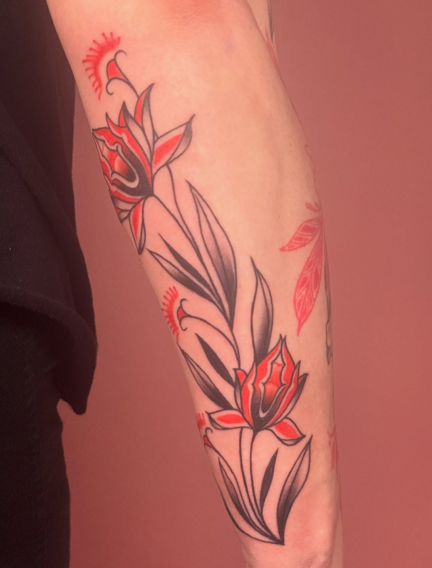 Floral arrangement black and grey tattoo on the forearm by Car🦋🌈 Dallas Tattoo Artist💖