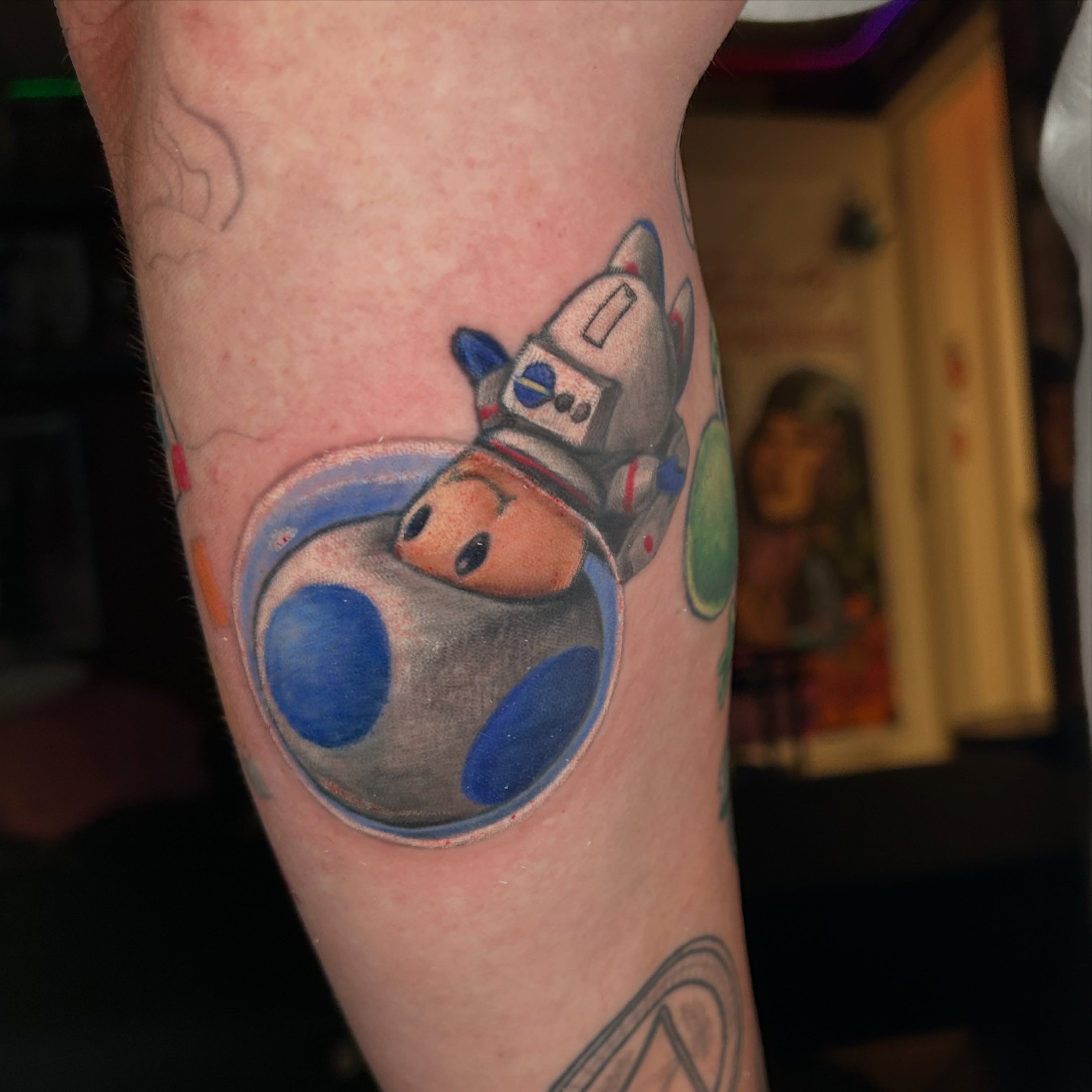 Space explorer realism tattoo on the forearm by Paisley Diaz, Lombard, Illinois