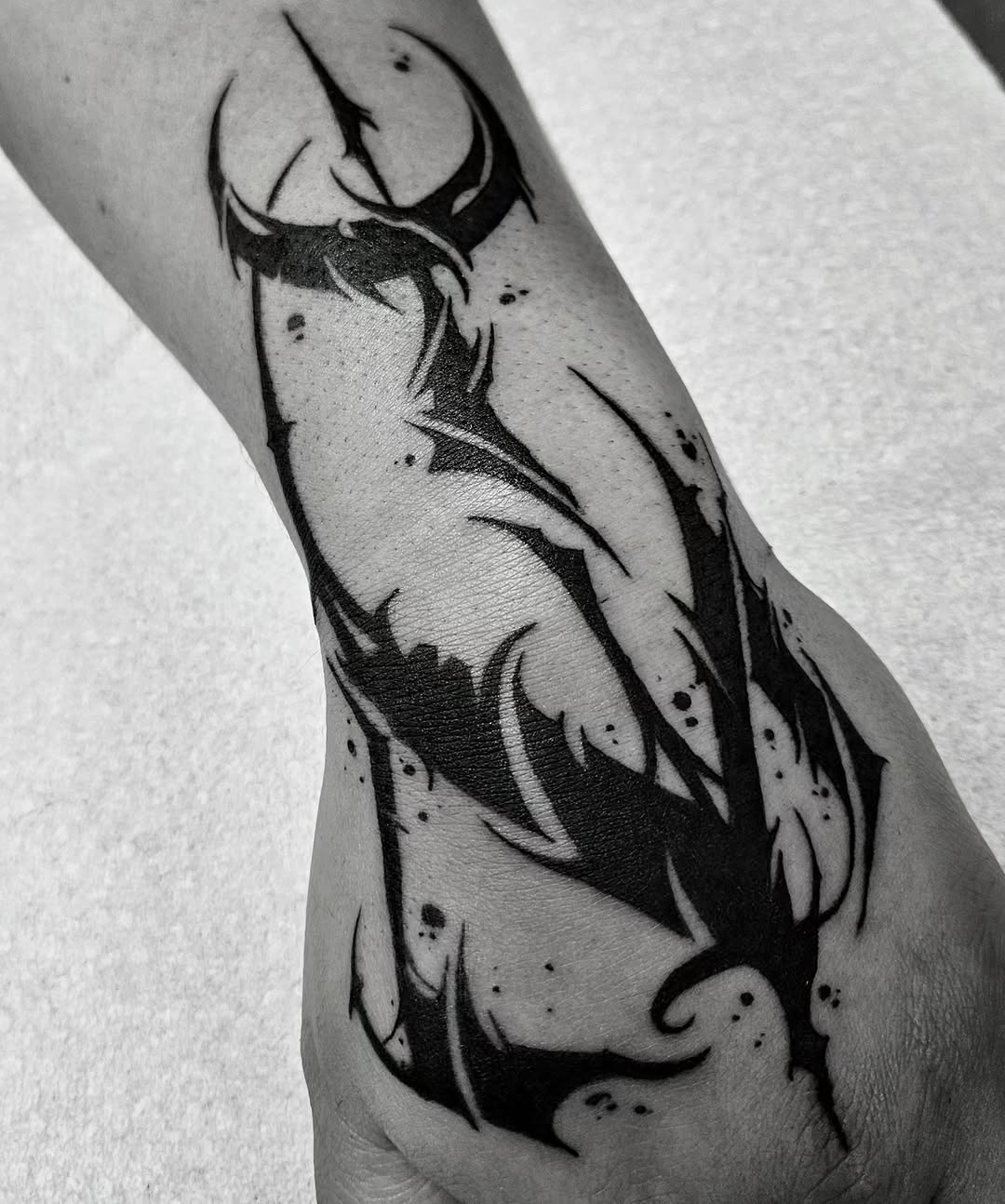 Tattoo by @d.r_tattoos — blackwork, tribal