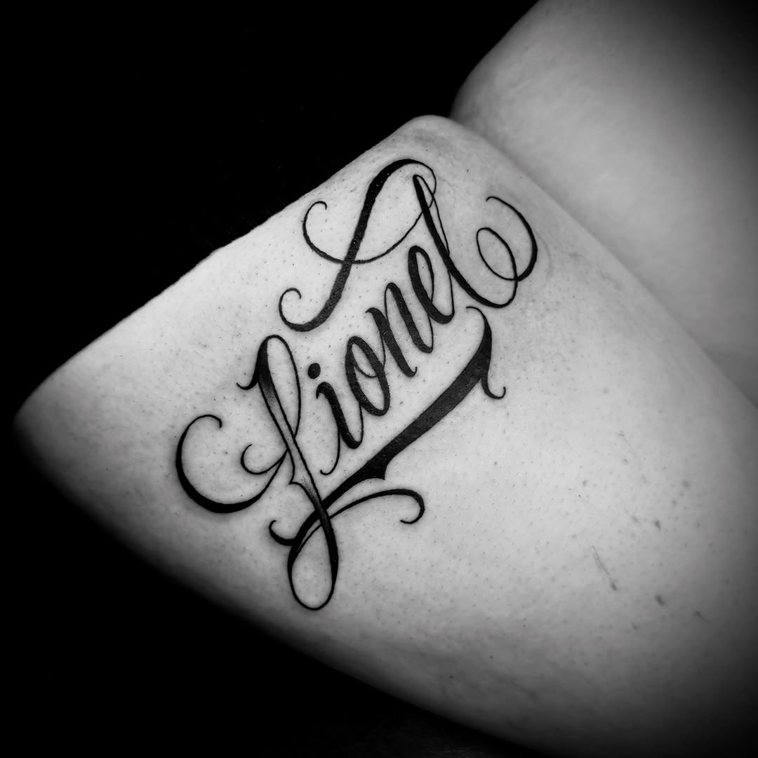 Script lettering lettering tattoo on the forearm by Jameson William Cowan