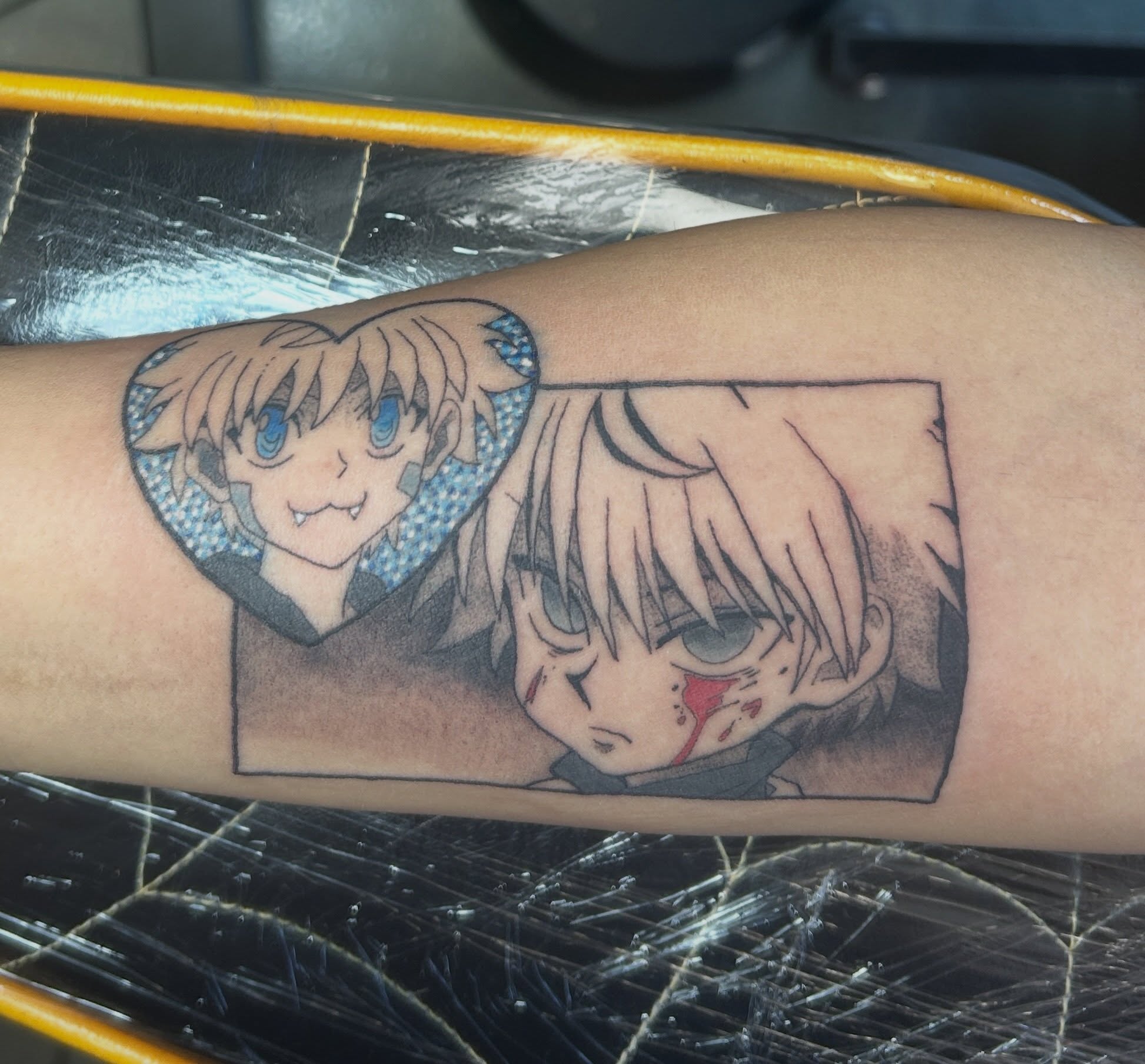 Anime characters anime tattoo on the forearm by Mickey