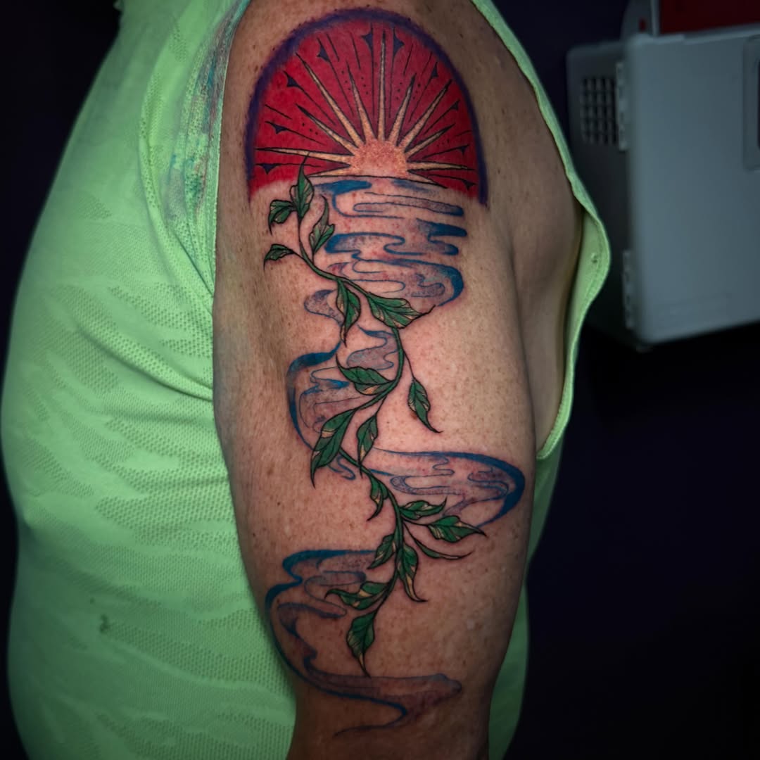 Hourglass with sunburst dotwork tattoo on the forearm by Lydia