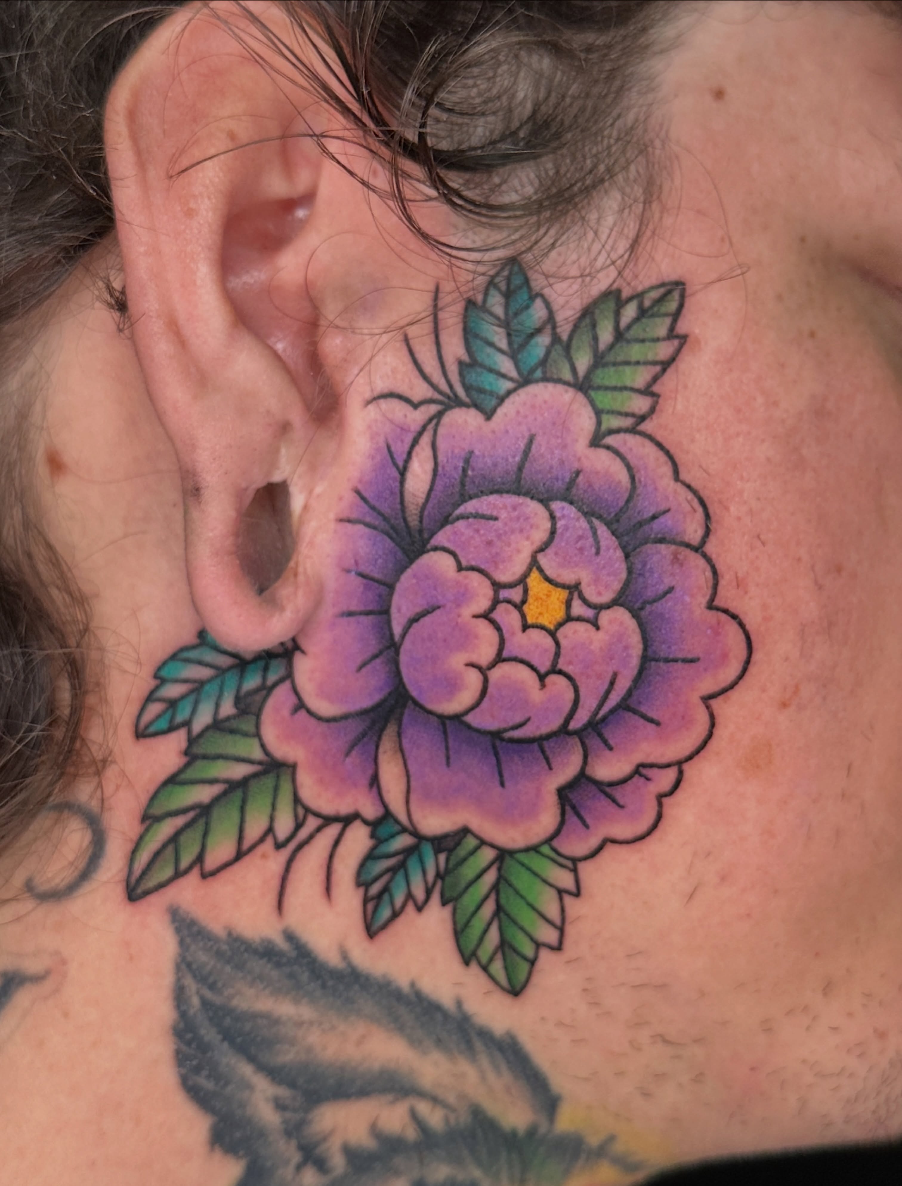 Purple flower American traditional tattoo on the neck by ⊹₊⟡⋆ 𝕵𝖔𝖎𝖊 ⊹₊⟡⋆
