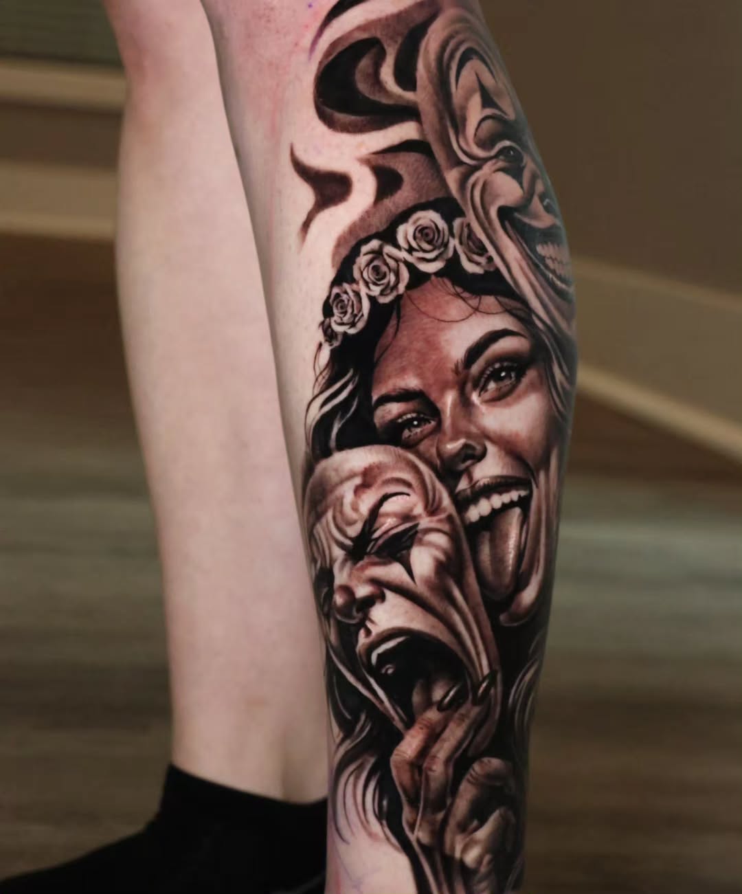 Woman with comedy and tragedy masks realism tattoo on the forearm by Jesus Bravo