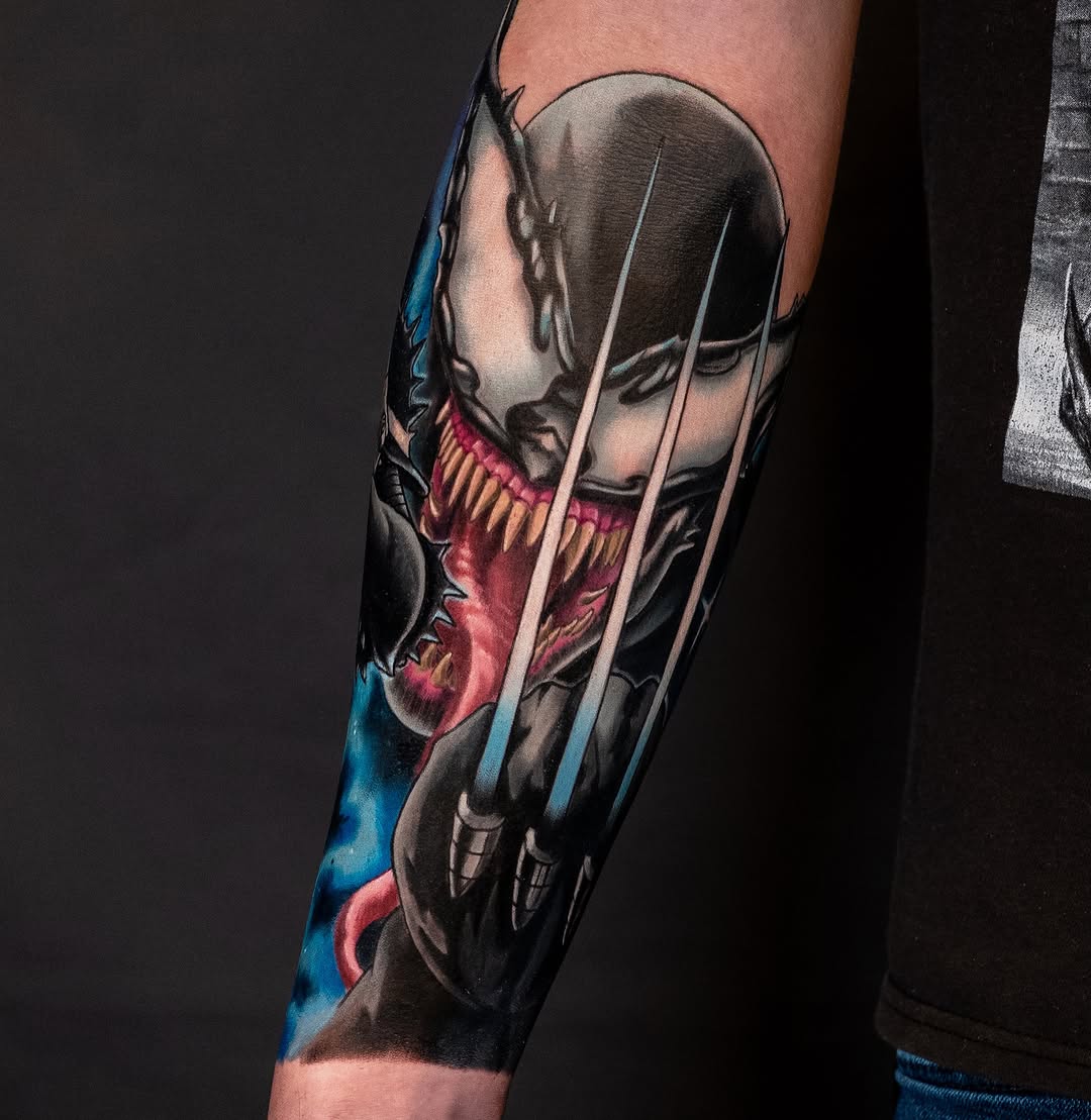 Venom character realism tattoo on the forearm by Alonzo Villa Tattoo