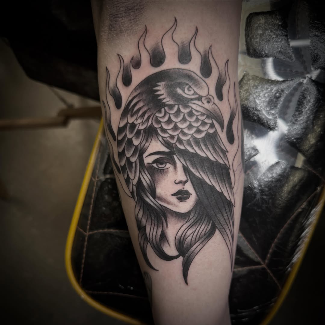 Woman with bird head realism tattoo on the forearm by ArJay Smith
