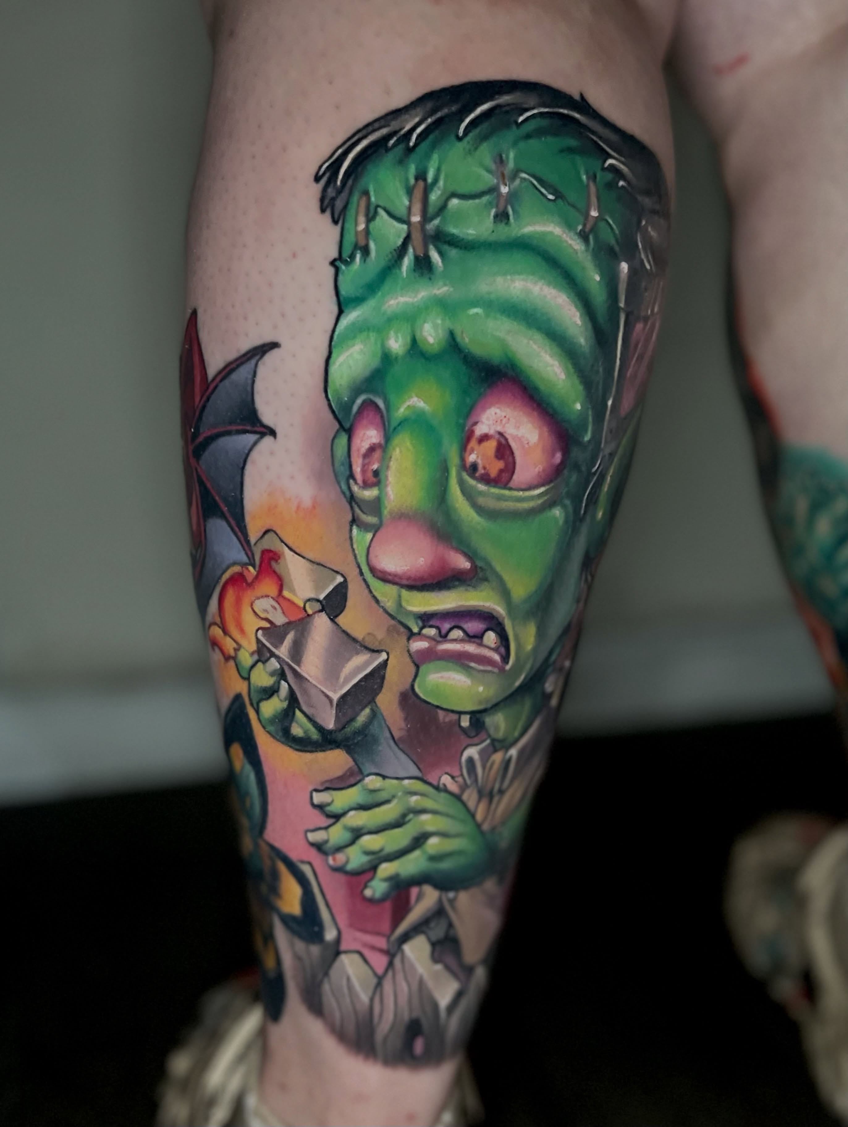 Monster head American traditional tattoo on the forearm by Jacob Webb