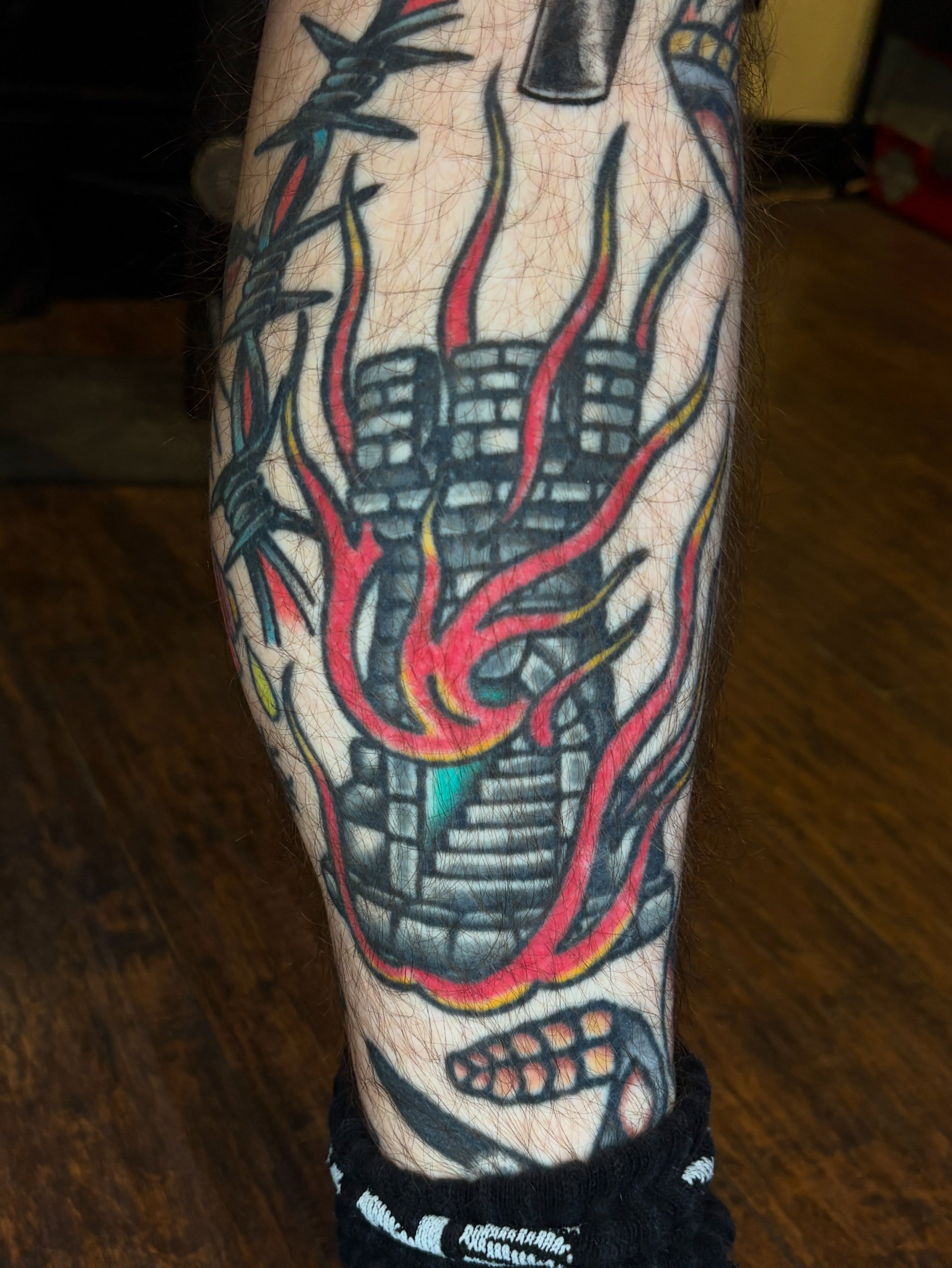 Skull with flames American traditional tattoo on the forearm by Max Klapp, Austin, Texas