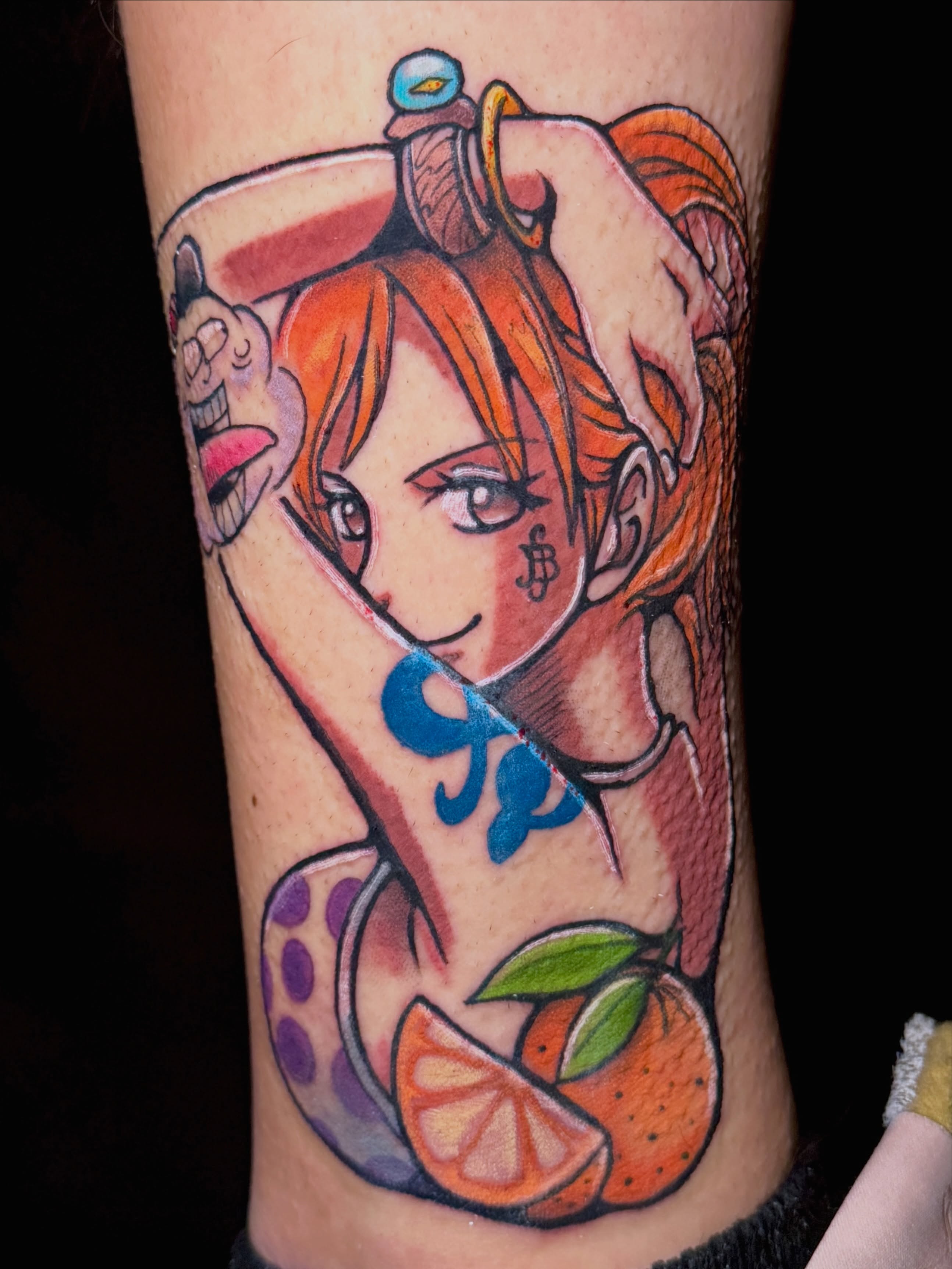 Anime character anime tattoo on the forearm by Breanna Fraielli