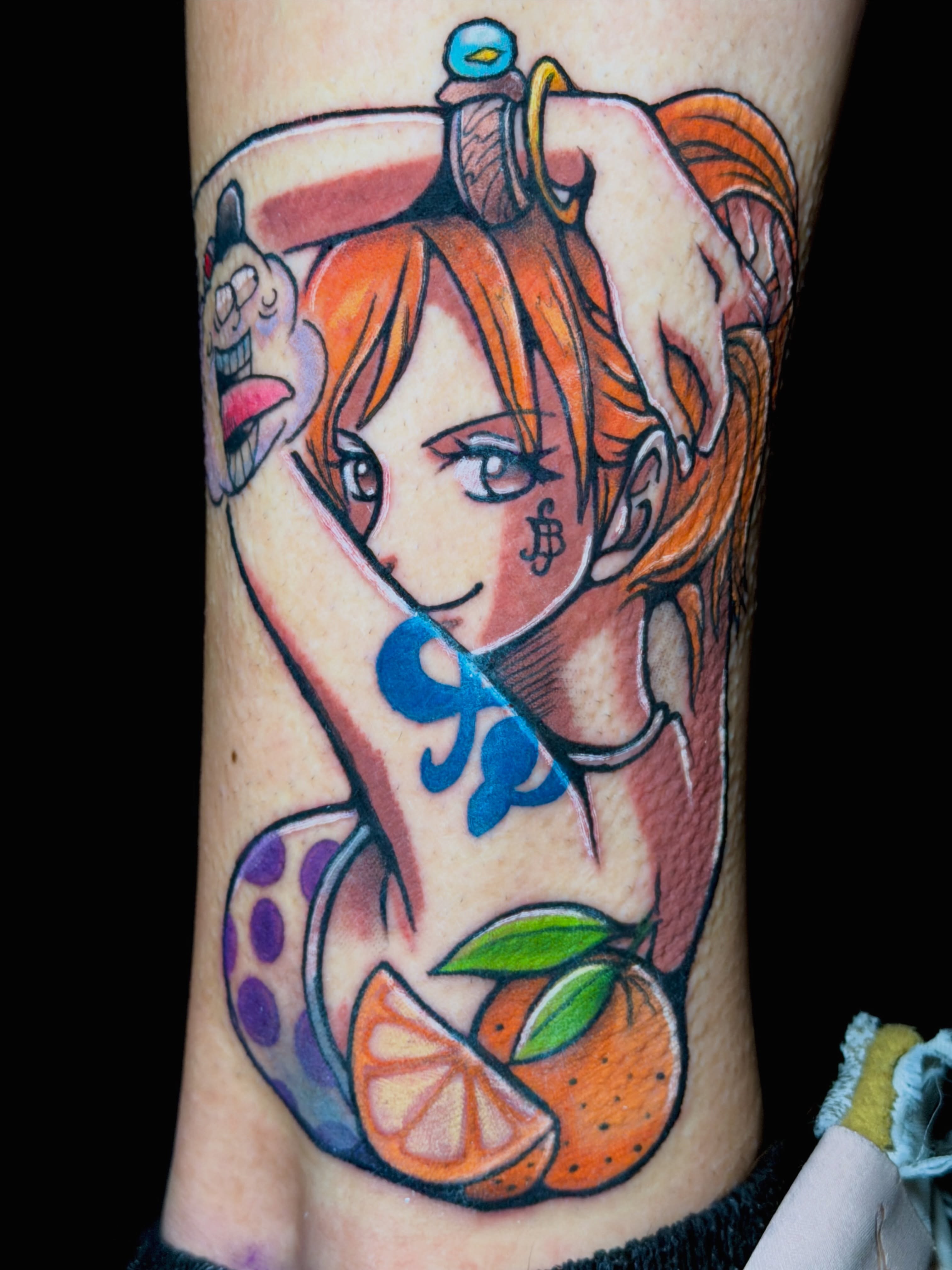 Anime character anime tattoo on the forearm by Breanna Fraielli
