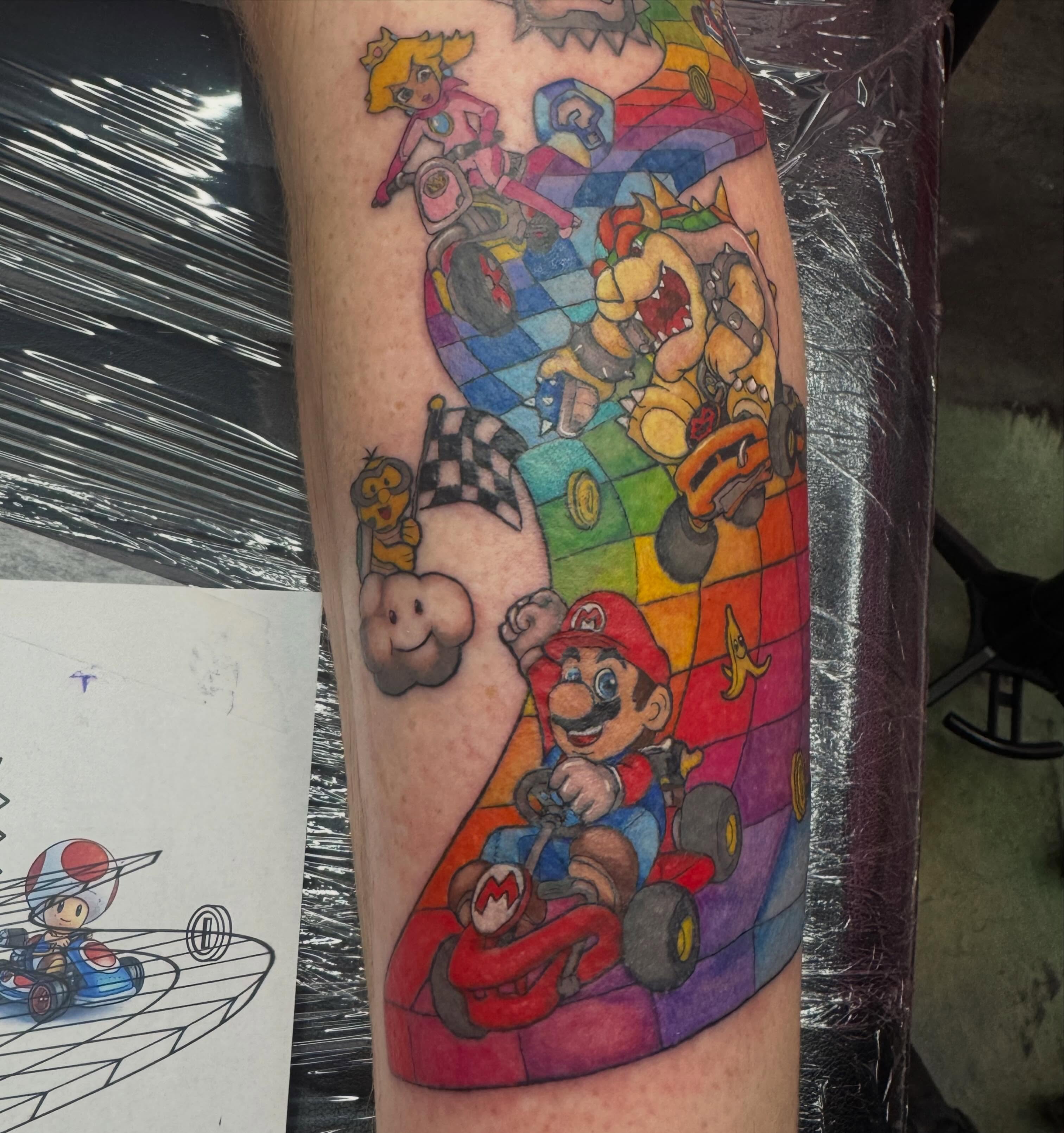 Mario kart new school tattoo on the forearm by Jada Reynolds