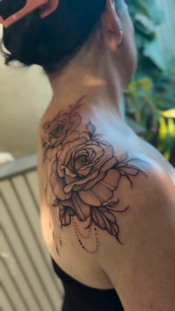 Rose tattoo on shoulder dotwork tattoo on the back by IVY