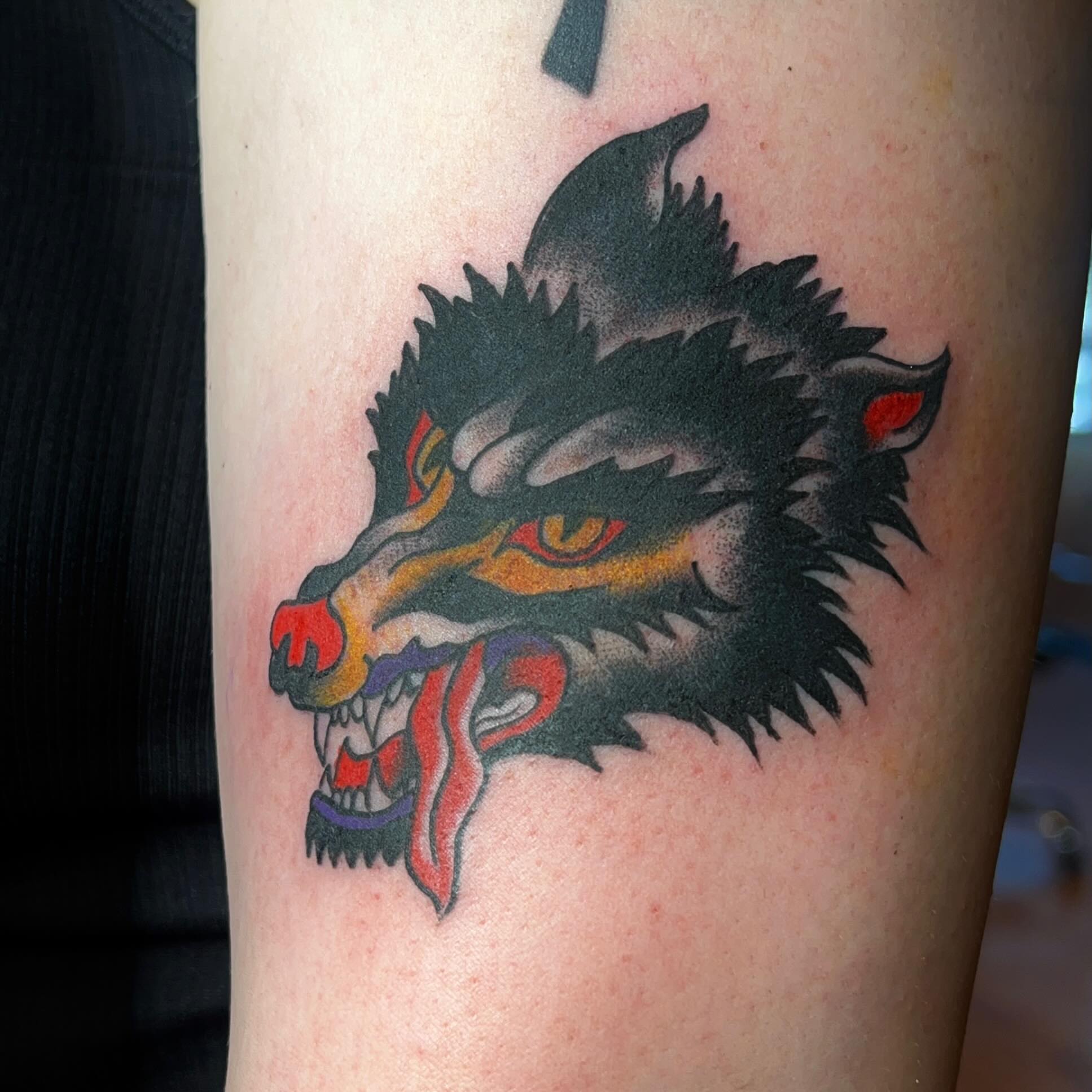 Wolf head American traditional tattoo on the forearm by Casey Lewis - Tattoo Artist, Cleveland Ohio