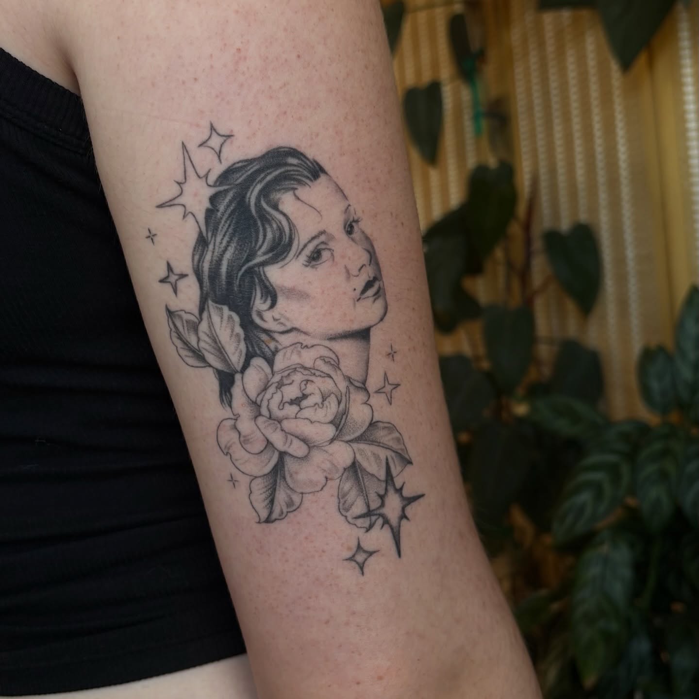 Woman with roses realism tattoo on the forearm by emery ♡ slc utah tattoo artist