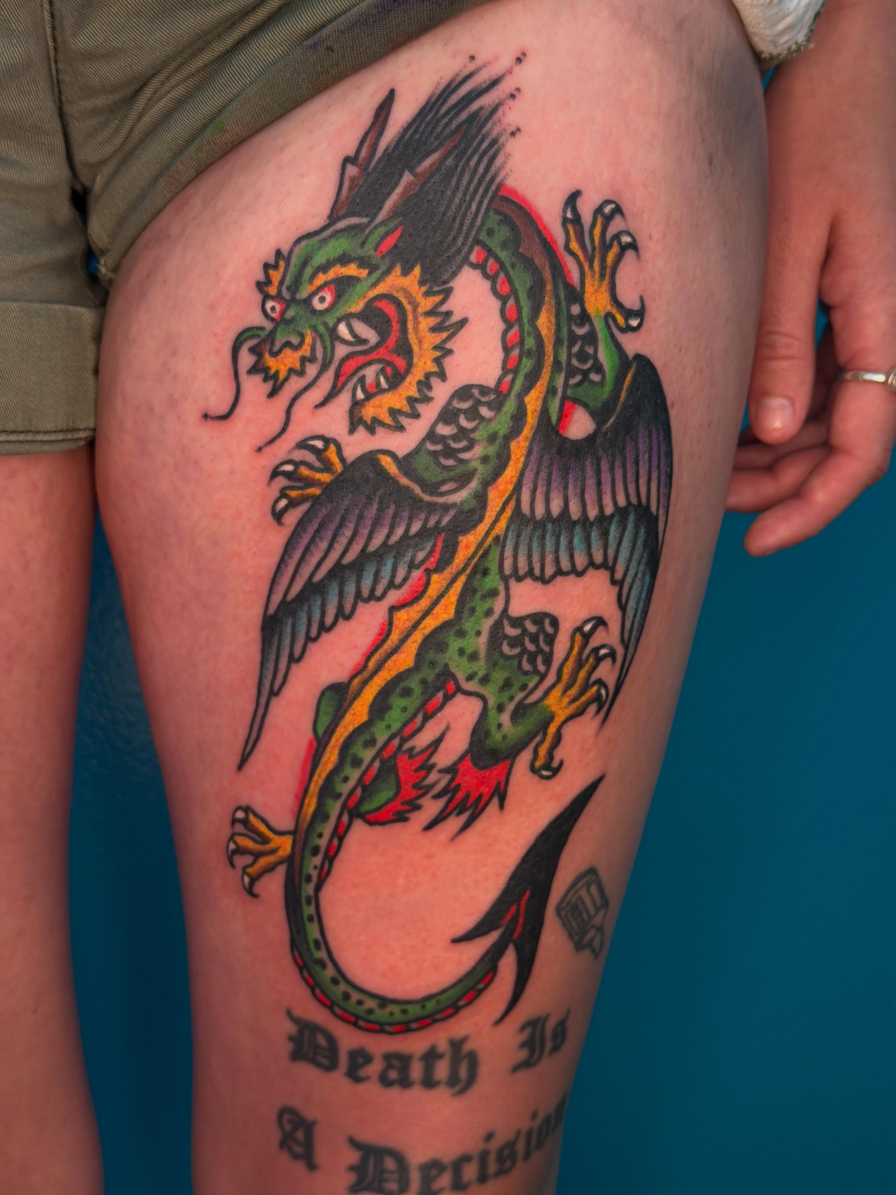 Dragon American traditional tattoo on the thigh by Joshua Speight