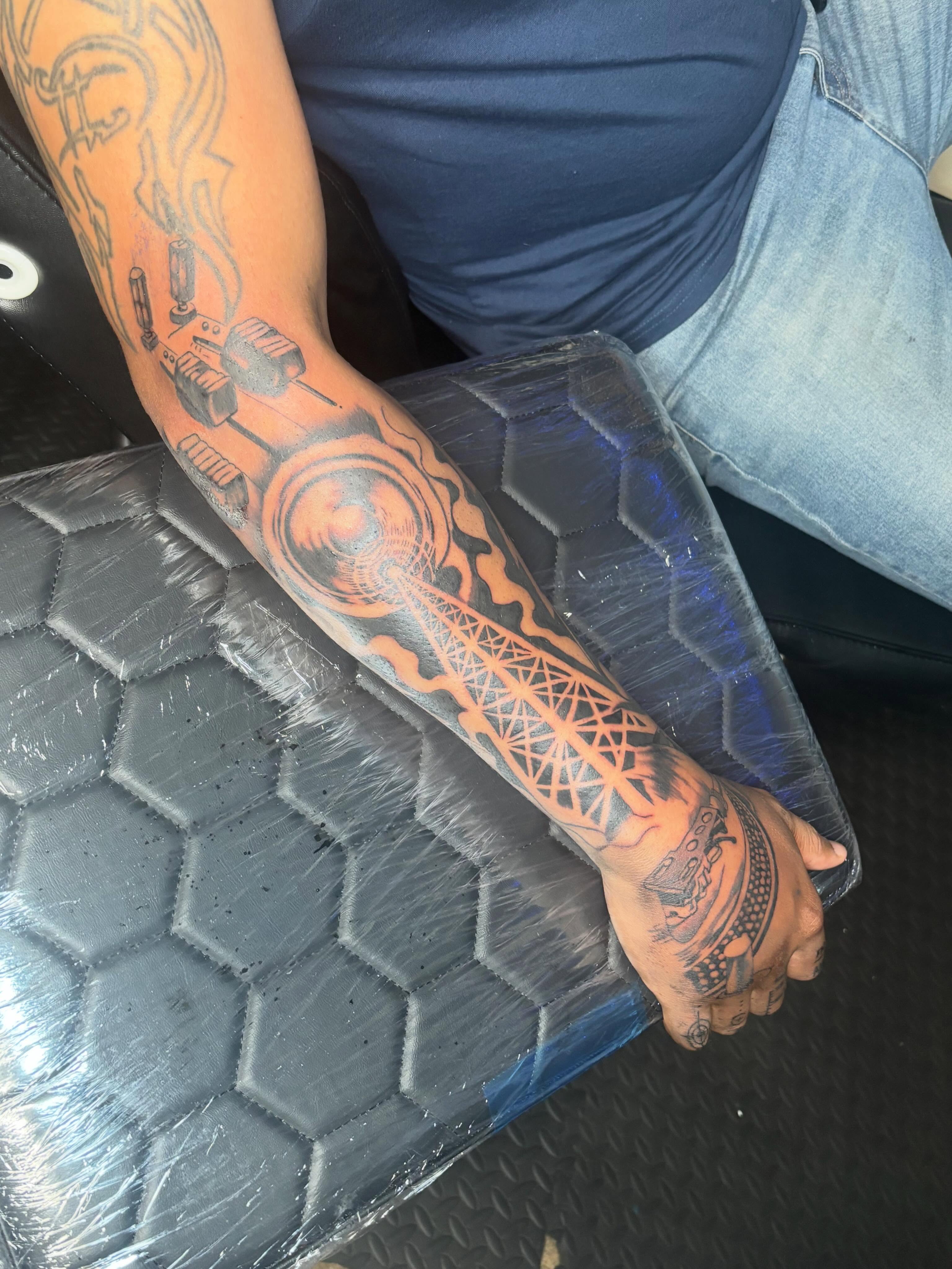 Mechanical gear and geometric patterns geometric tattoo on the forearm by Mr.K