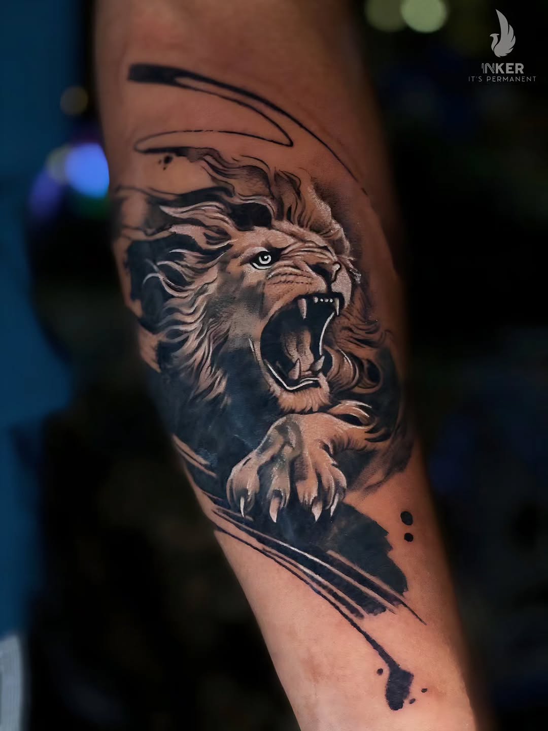 Roaring lion realism tattoo on the forearm by Shubhadeep Mukherjee