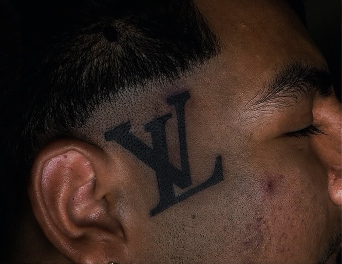 LV logo tattoo on the head by Las Vegas Tattoo Artist ๐ฒโ๏ธ