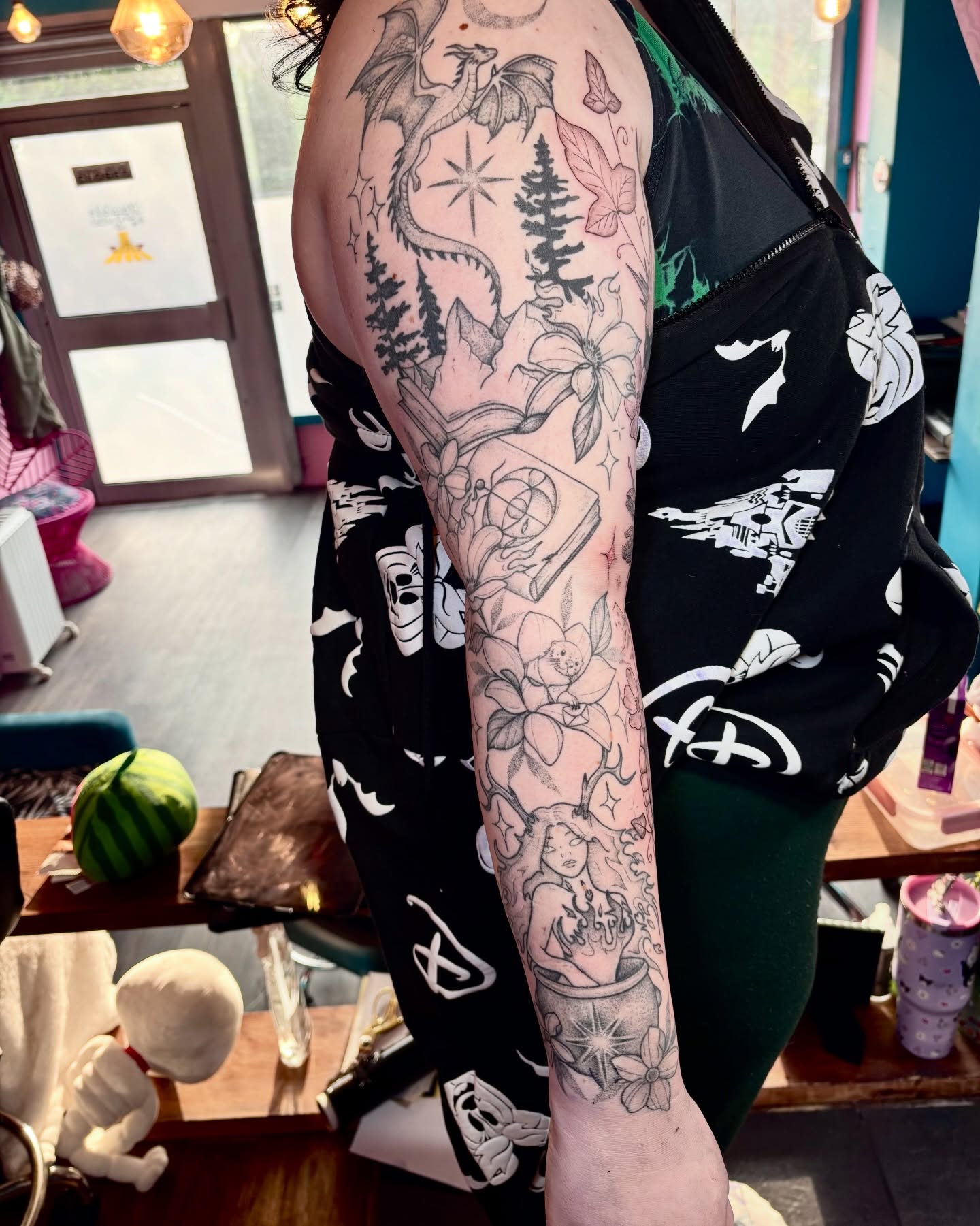 Mythical creatures and nature neo-traditional tattoo on the forearm by Charlotte Brown, Leeds, England