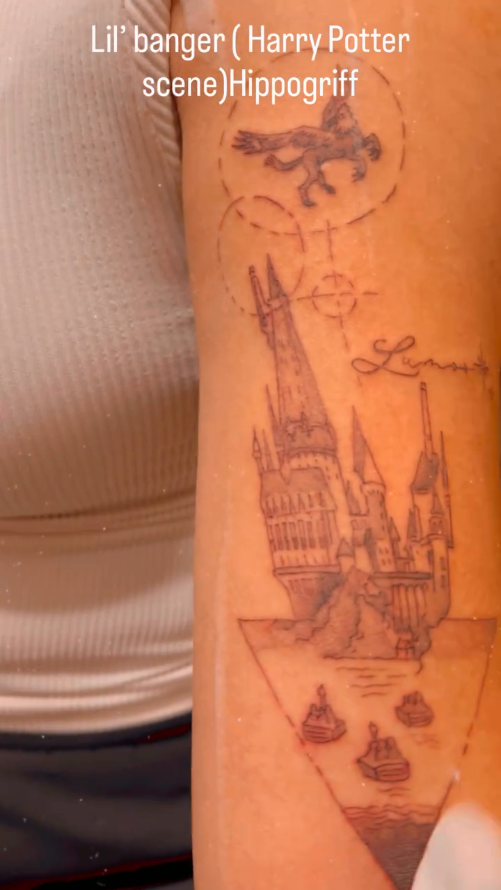 Hogwarts castle with hippogriff tattoo on the forearm by Engel Zurc