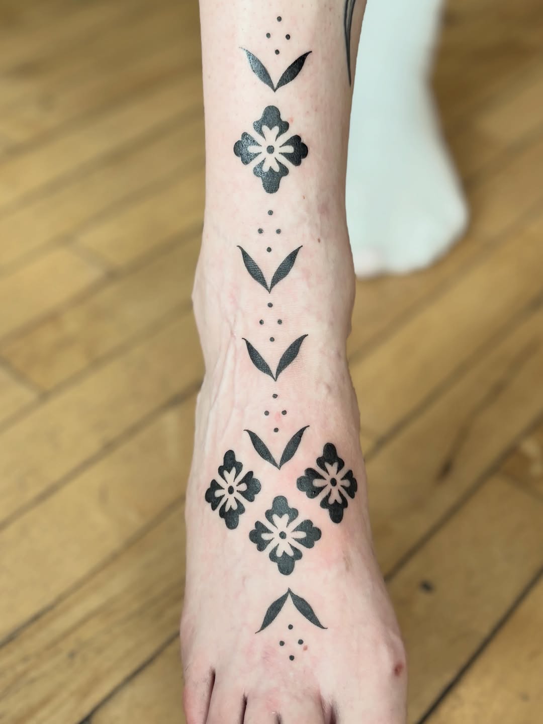 Tattoo by @flowers.for.all.occasions โ blackwork, ornamental