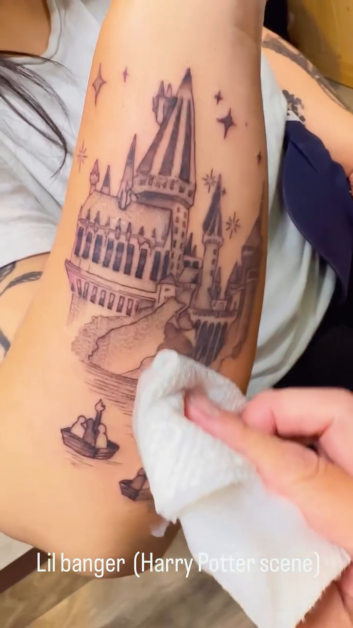Hogwarts castle scene dark art tattoo on the forearm by Engel Zurc