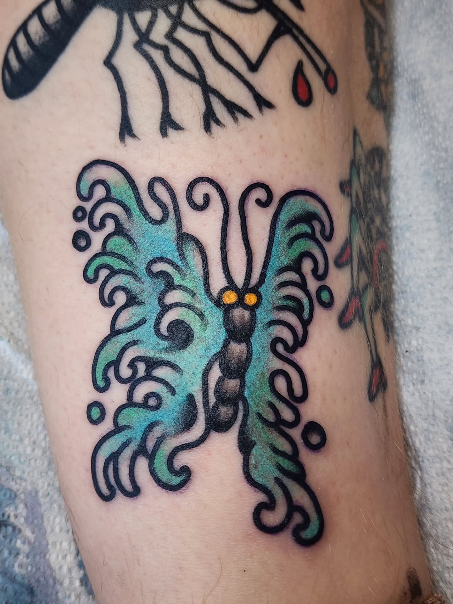 Butterfly American traditional tattoo on the forearm by πππππ