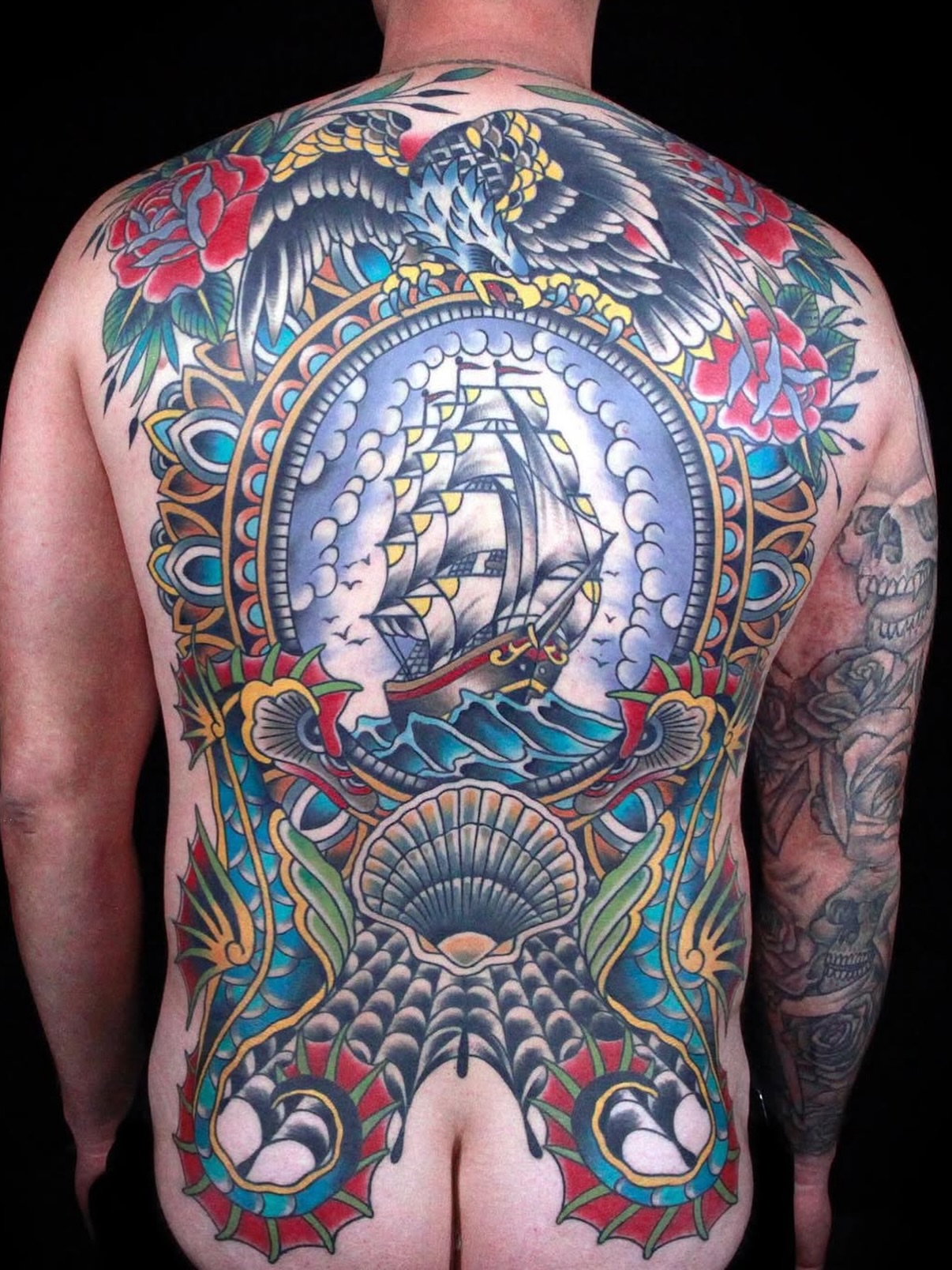 Ship and sea American traditional tattoo on the back by Dave Kruseman