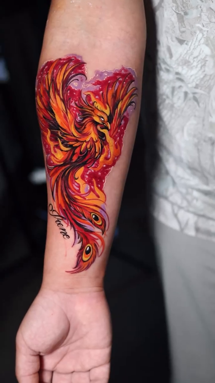 Phoenix tattoo realism tattoo on the forearm by Insight Ink Tattoo
