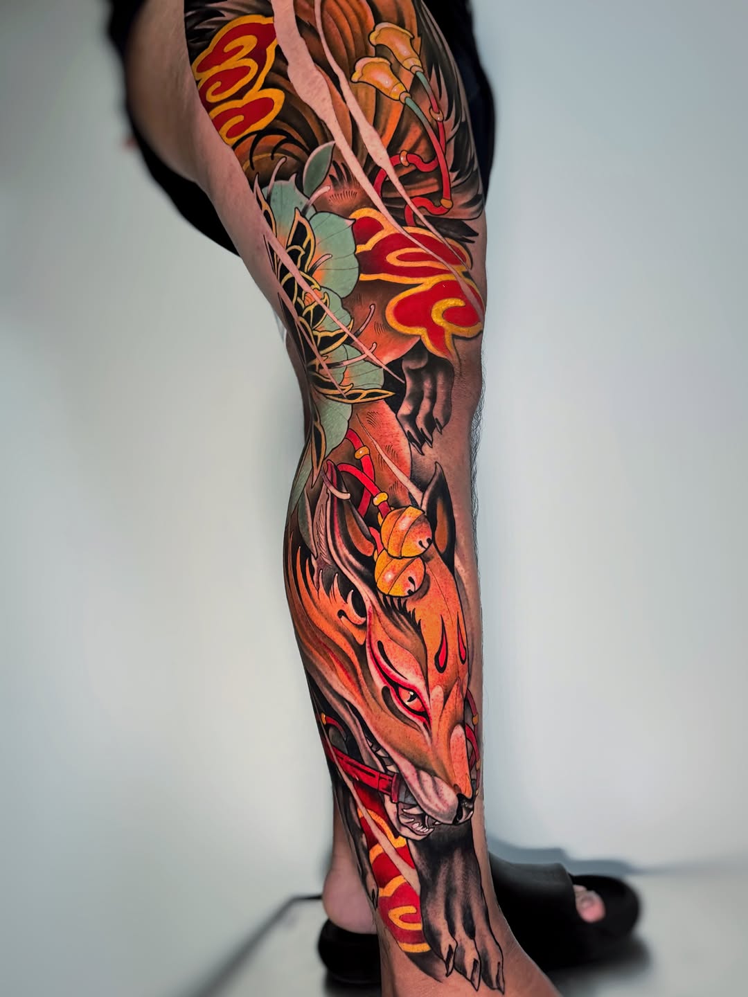 Fox and floral elements Japanese tattoo on the leg by Aitor Arie, Roseville, California