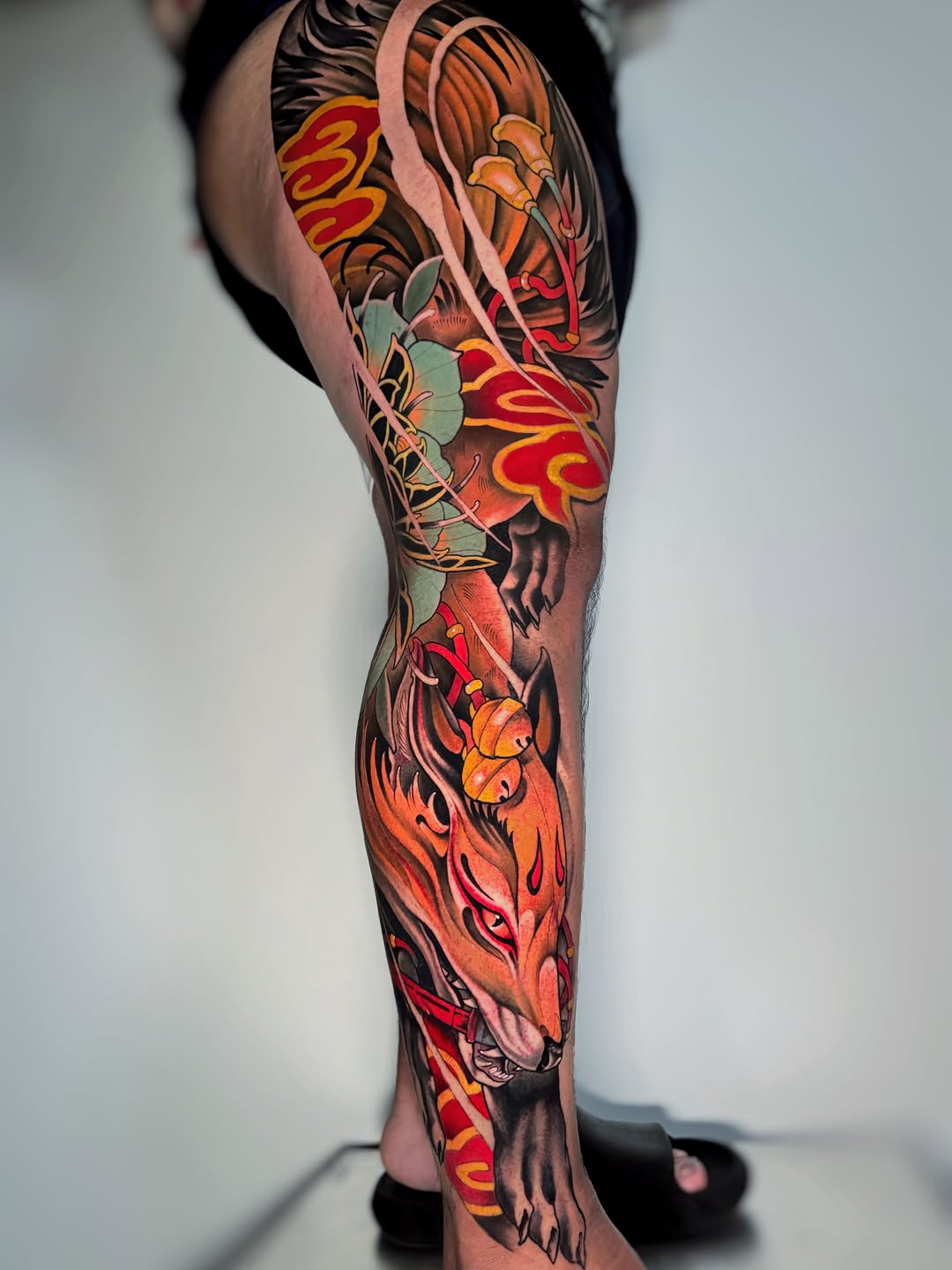Fox and floral elements Japanese tattoo on the calf by Aitor Arie, Roseville, California