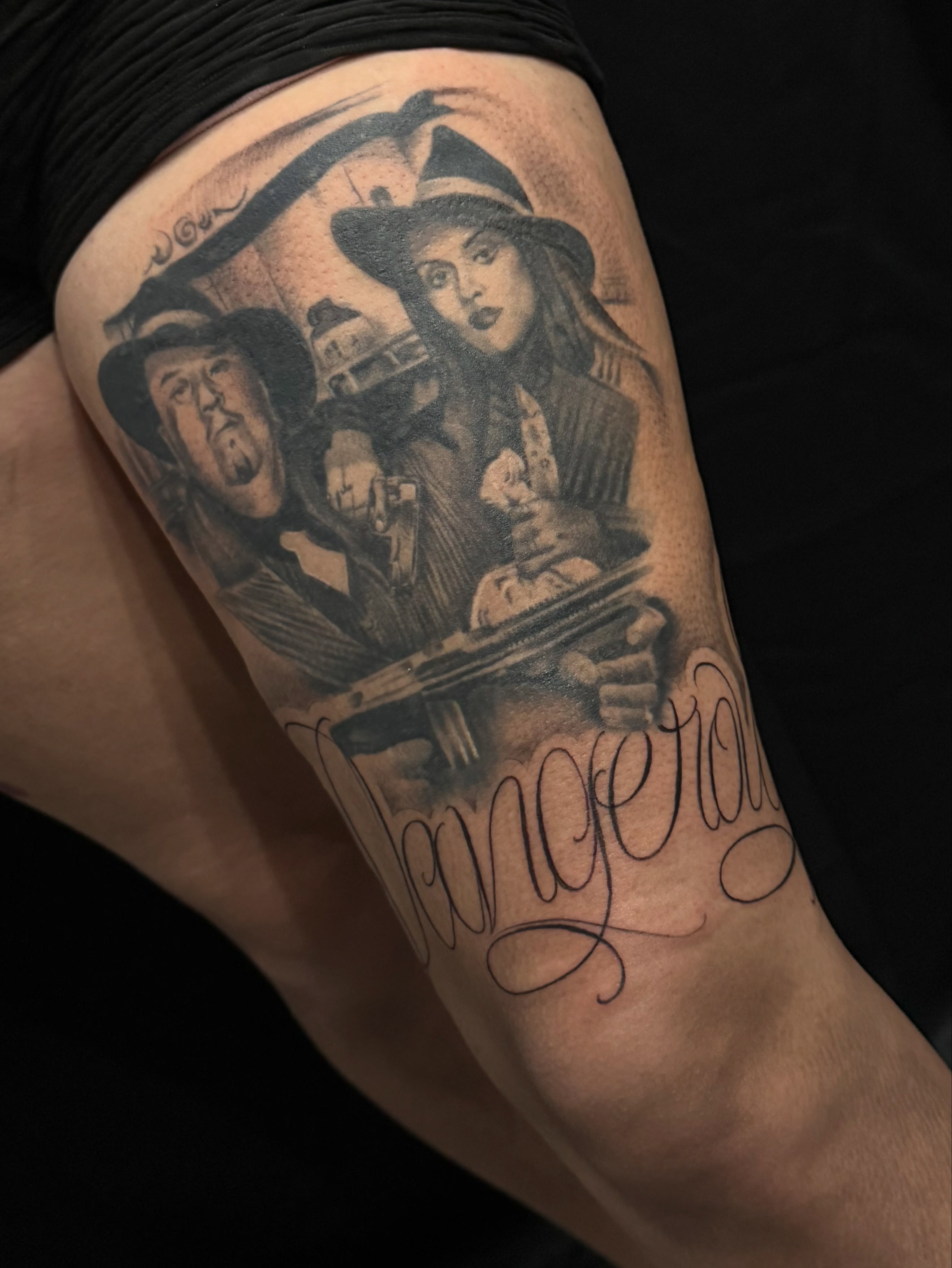 Madonna and Don Johnson black and grey tattoo on the thigh by Angel Pineda-Rodriguez