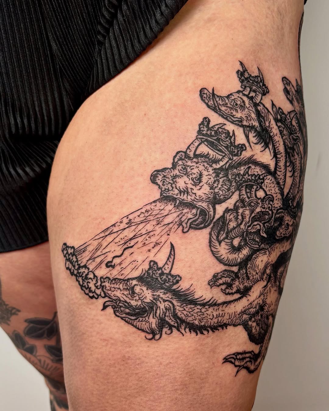 Multi-headed dragon realism tattoo on the thigh by kendle