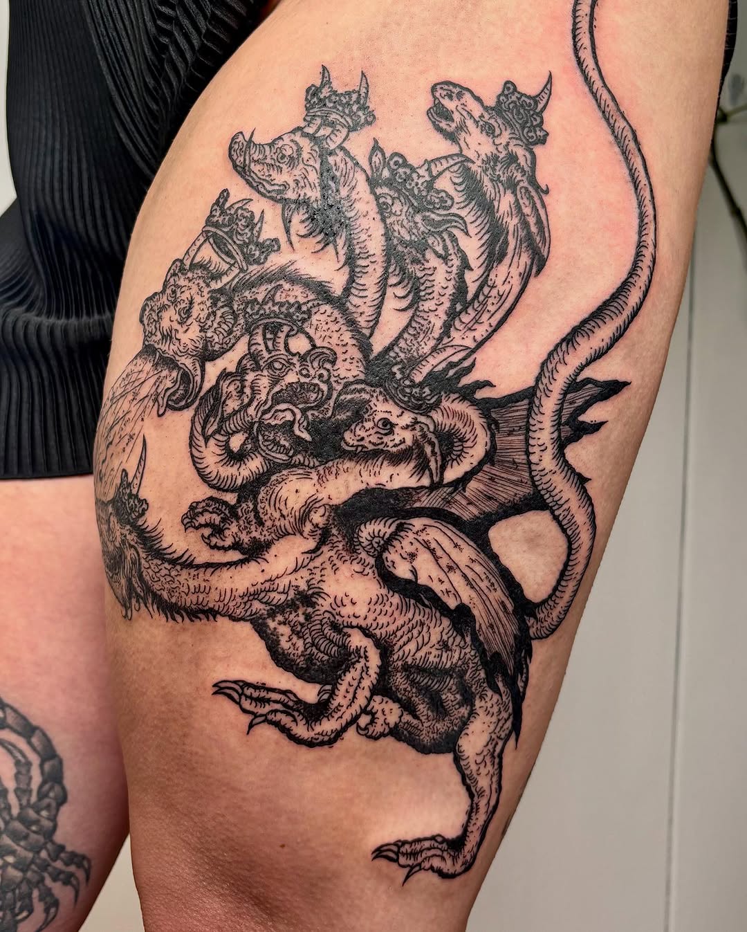 Hydra-like multi-headed dragon realism tattoo on the thigh by kendle