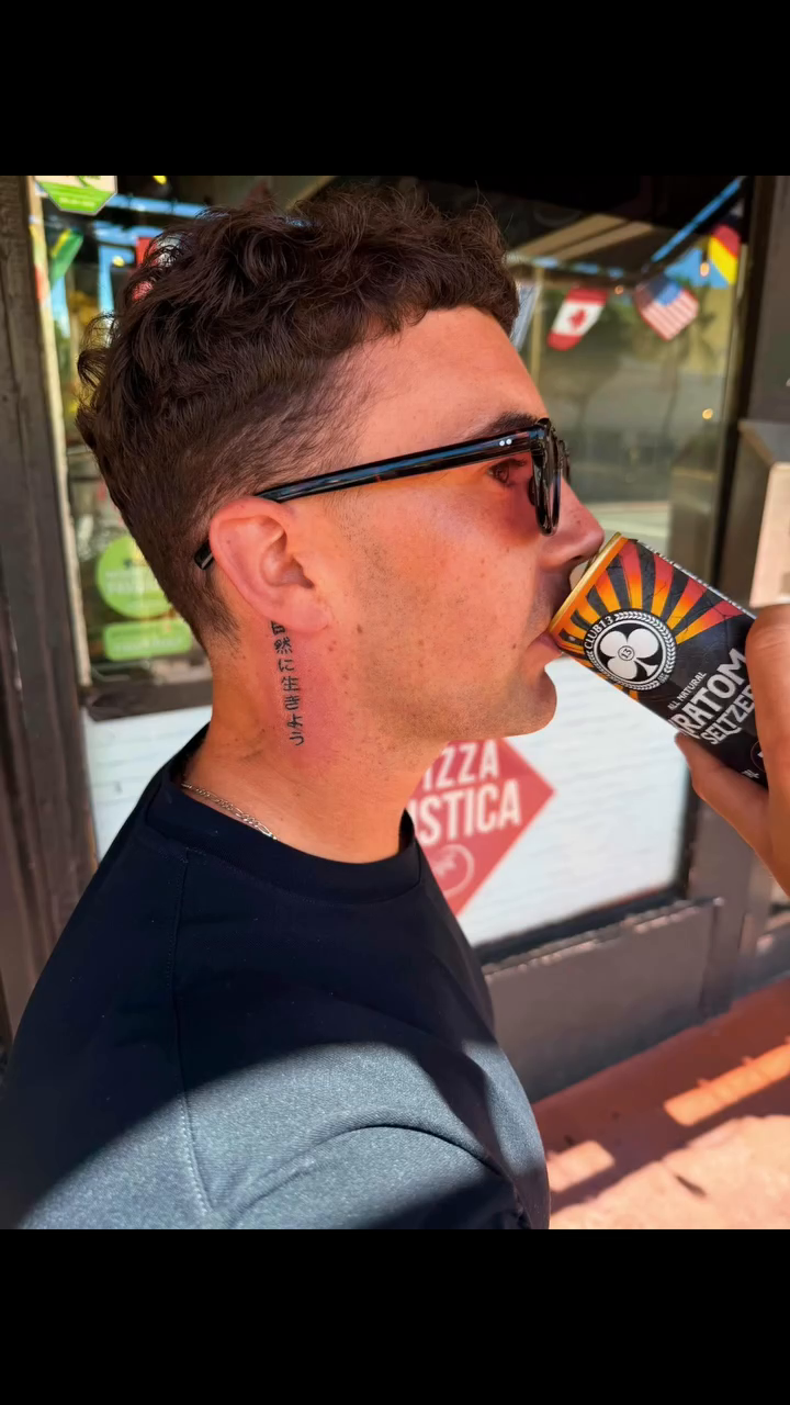 Script tattoo on neck tattoo on the chest by Miami Beach Tattoo Artist