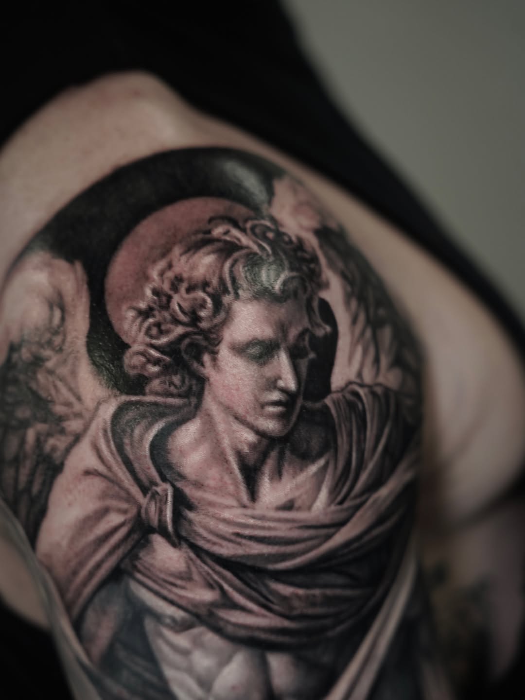 Angelic figure realism tattoo on the shoulder by Nelson Tellez
