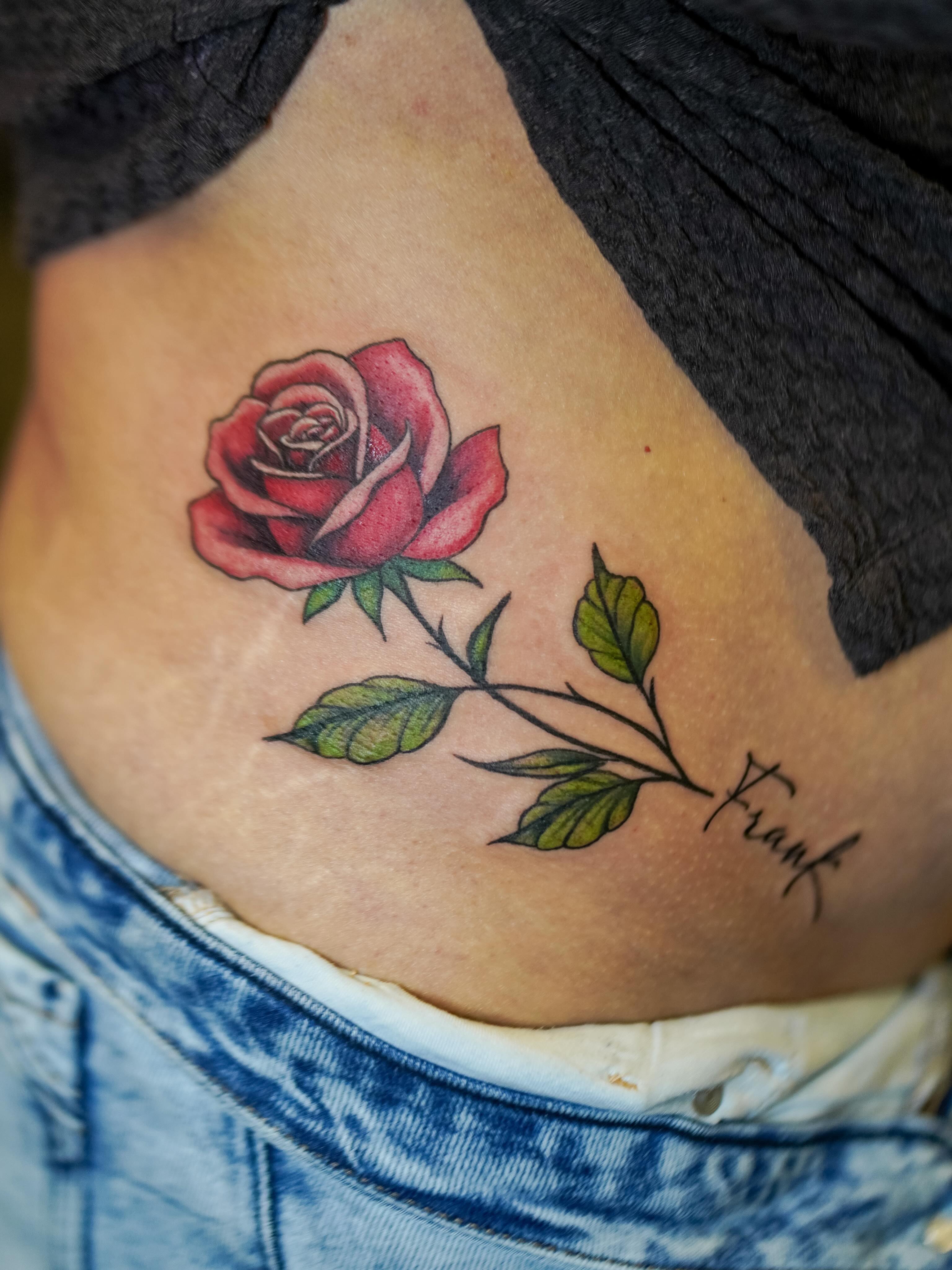 Rose realism tattoo on the ribs by Skylar