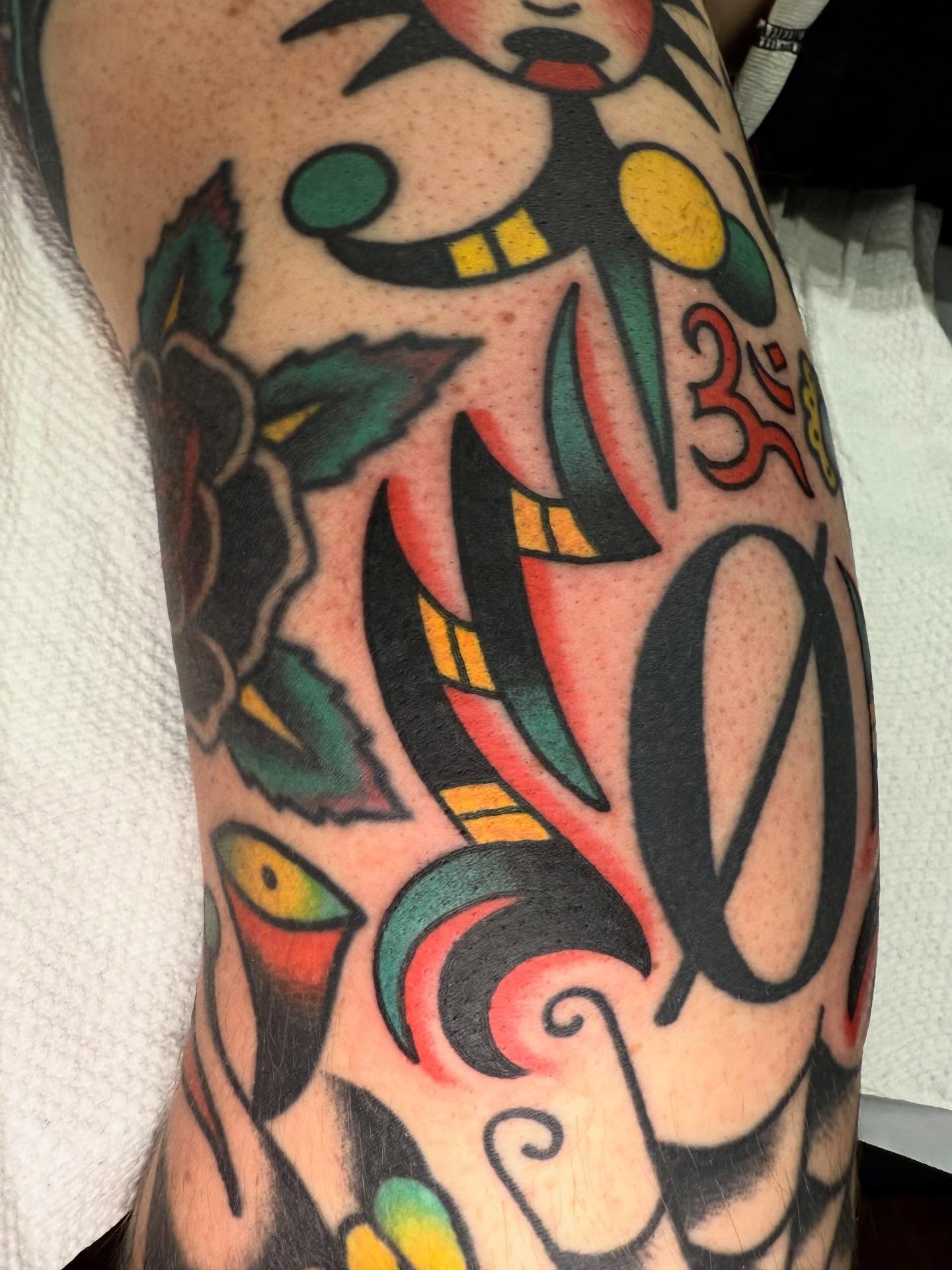 Abstract design American traditional tattoo on the forearm by Zeb Winters