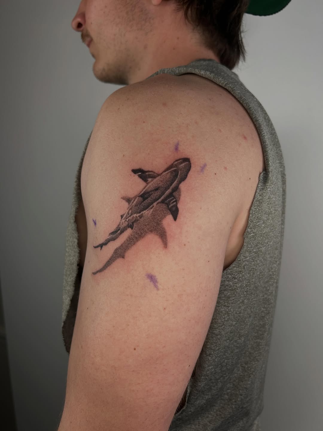 Two sharks fine line tattoo on the shoulder by J